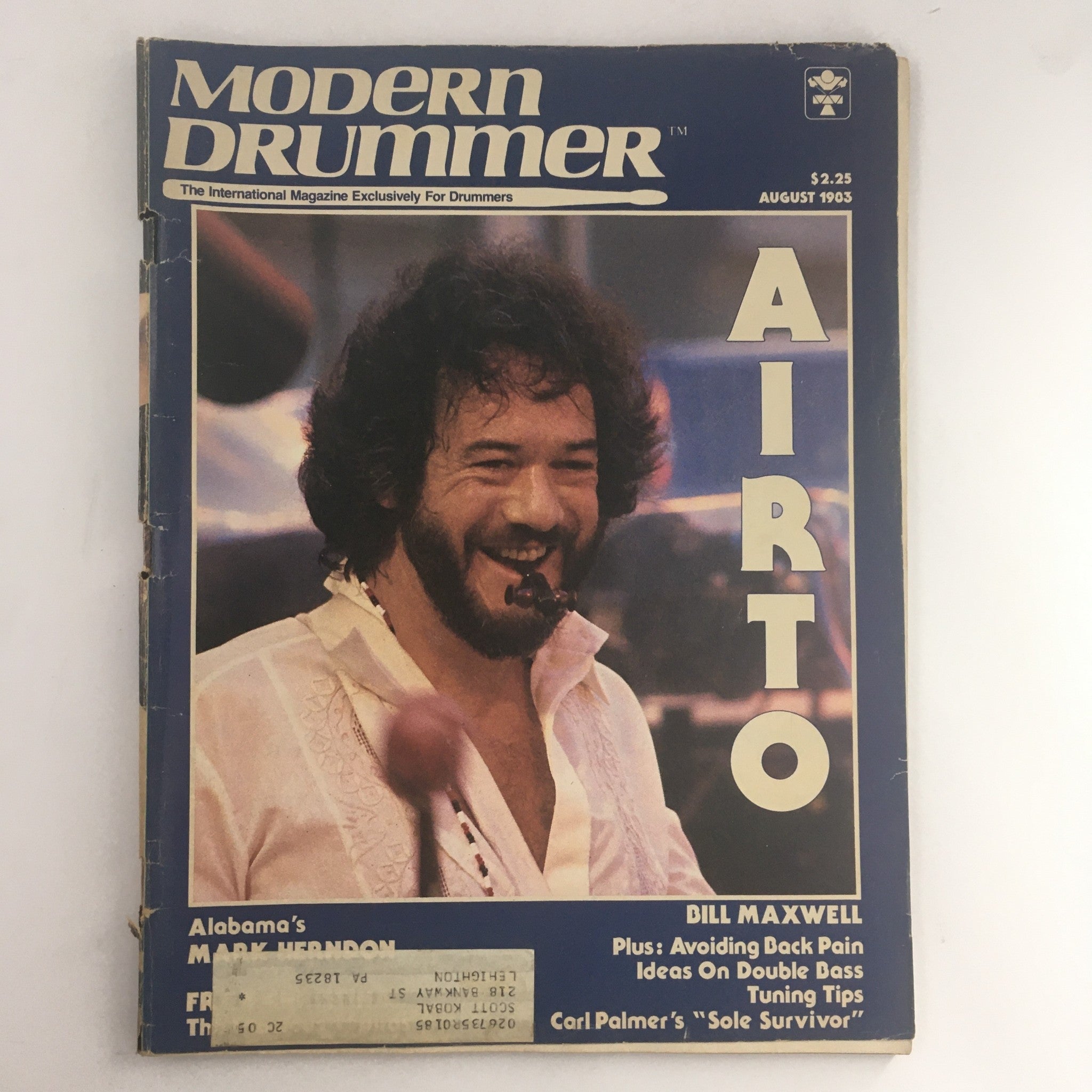 Cover of Modern Drummer Magazine August 1983 featuring Airto Moreira with a smile, showcasing insights into drumming from iconic musicians.