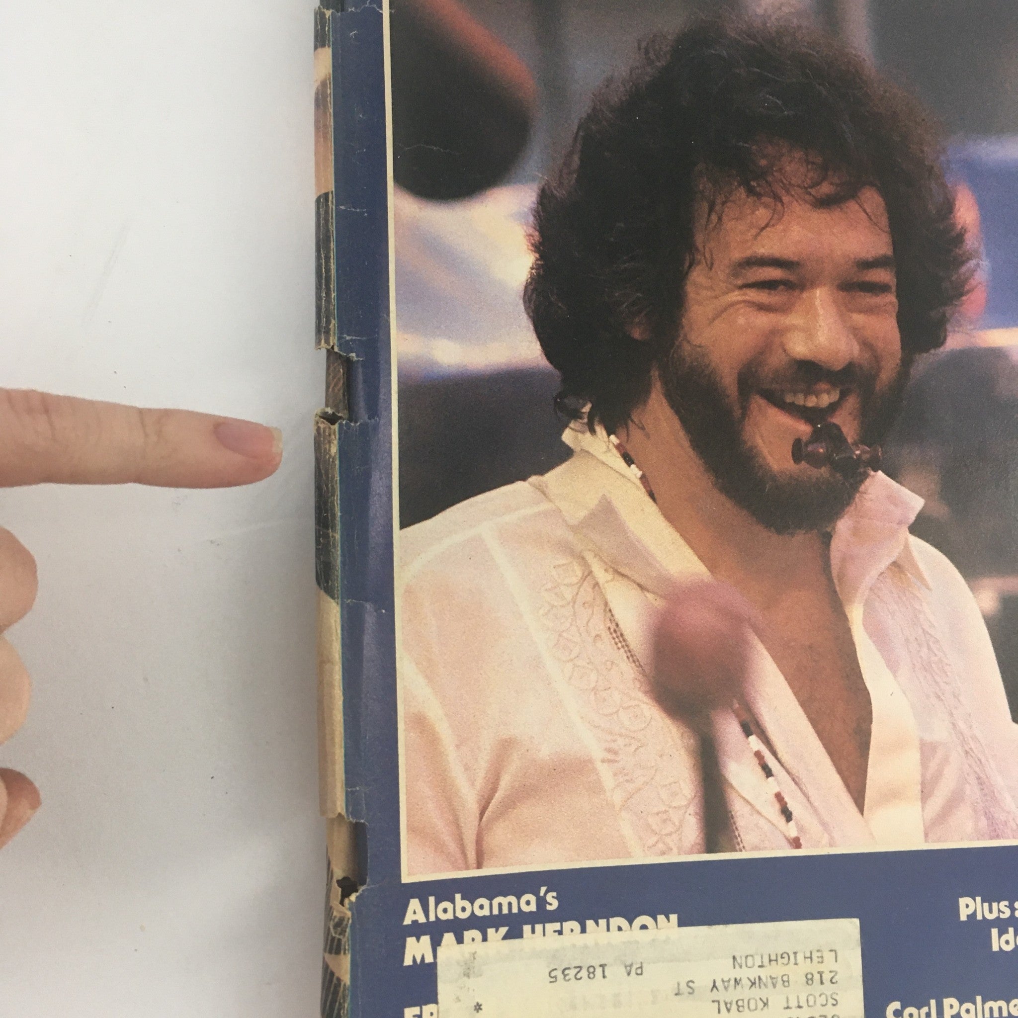 Close-up view of the August 1983 cover of Modern Drummer Magazine featuring Airto Moreira, highlighting the magazine's vintage design and condition.