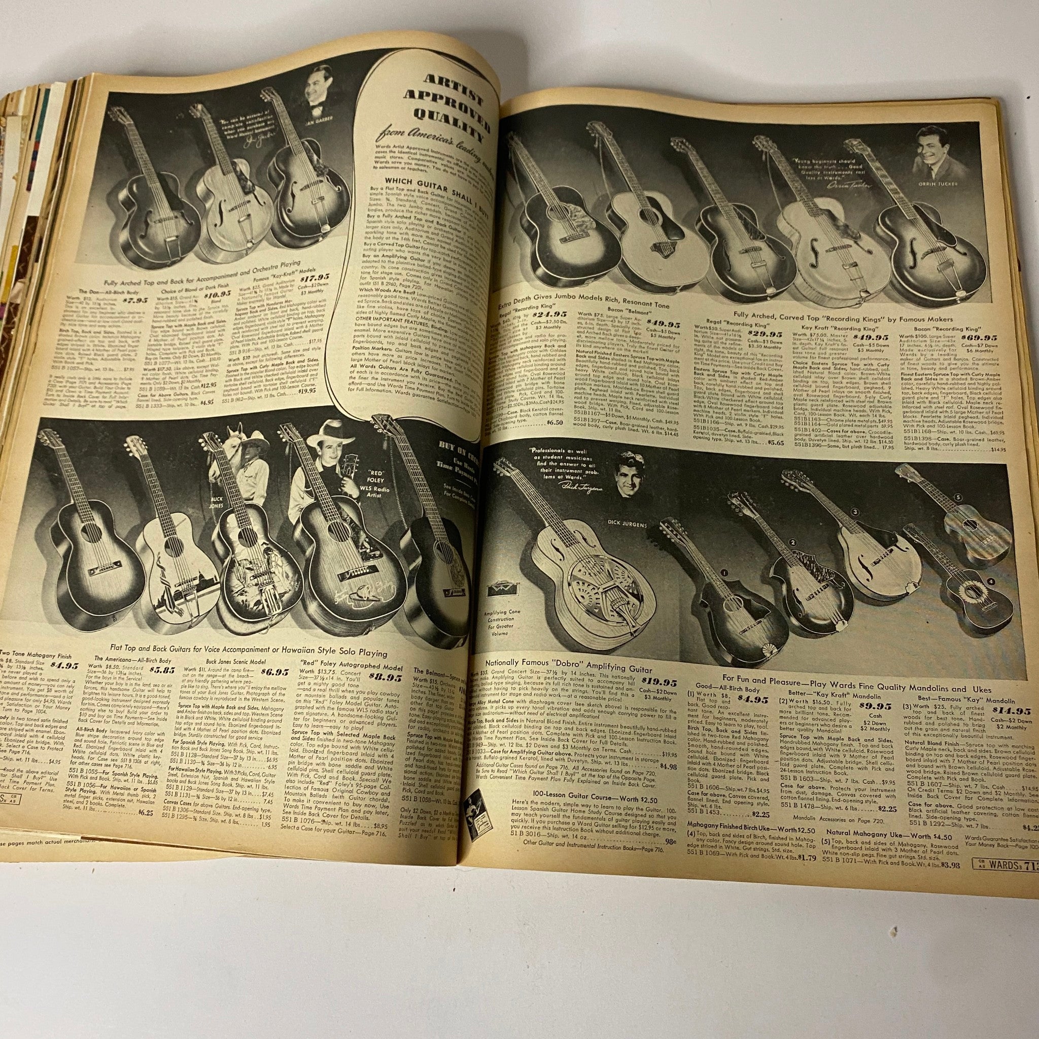 Interior image of the 1942 Montgomery Ward Spring and Summer Catalog featuring a selection of acoustic guitars for sale.