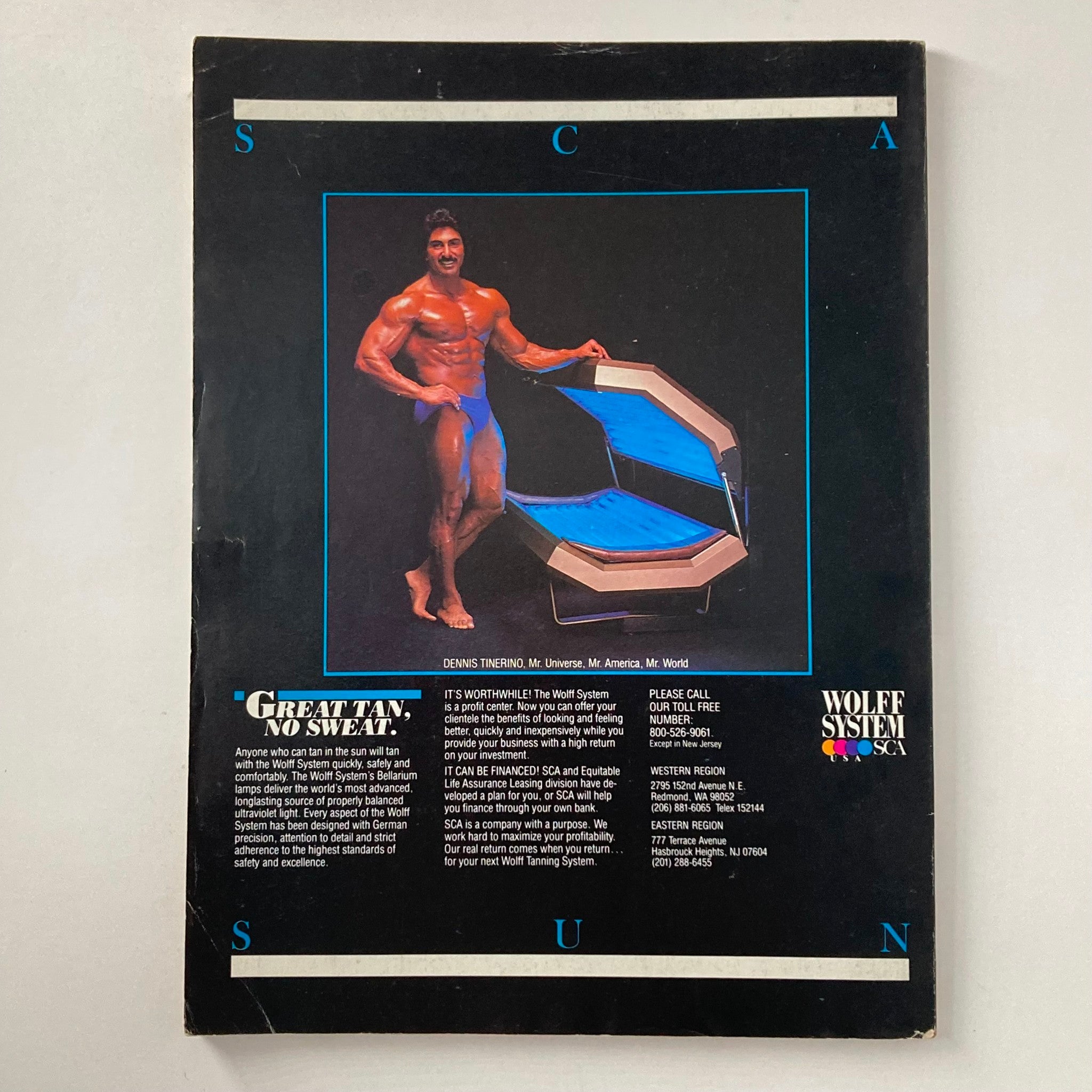 Back cover of Joe Weider's Muscle & Fitness Magazine July 1983 featuring Dennis Tinerino, a bodybuilder known as Mr. Universe, Mr. America, and Mr. World, promoting the Wolff Tanning System. The cover displays a muscular Tinerino posing next to a tanning bed with eye-catching text regarding tanning benefits.