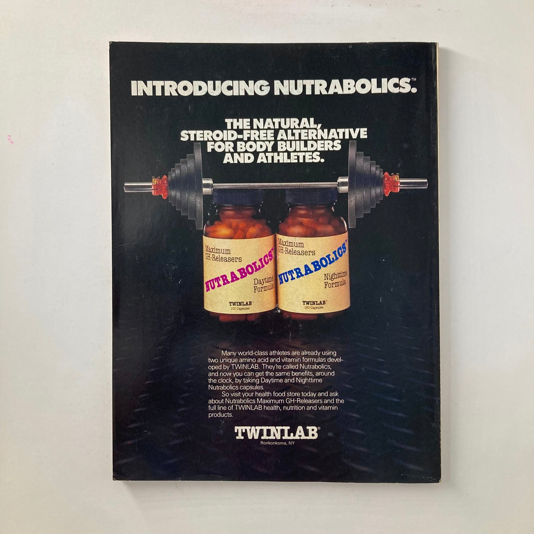 Back cover of Joe Weider's Muscle & Fitness Magazine March 1985, promoting Nutrabolics, a natural steroid-free alternative for bodybuilders.