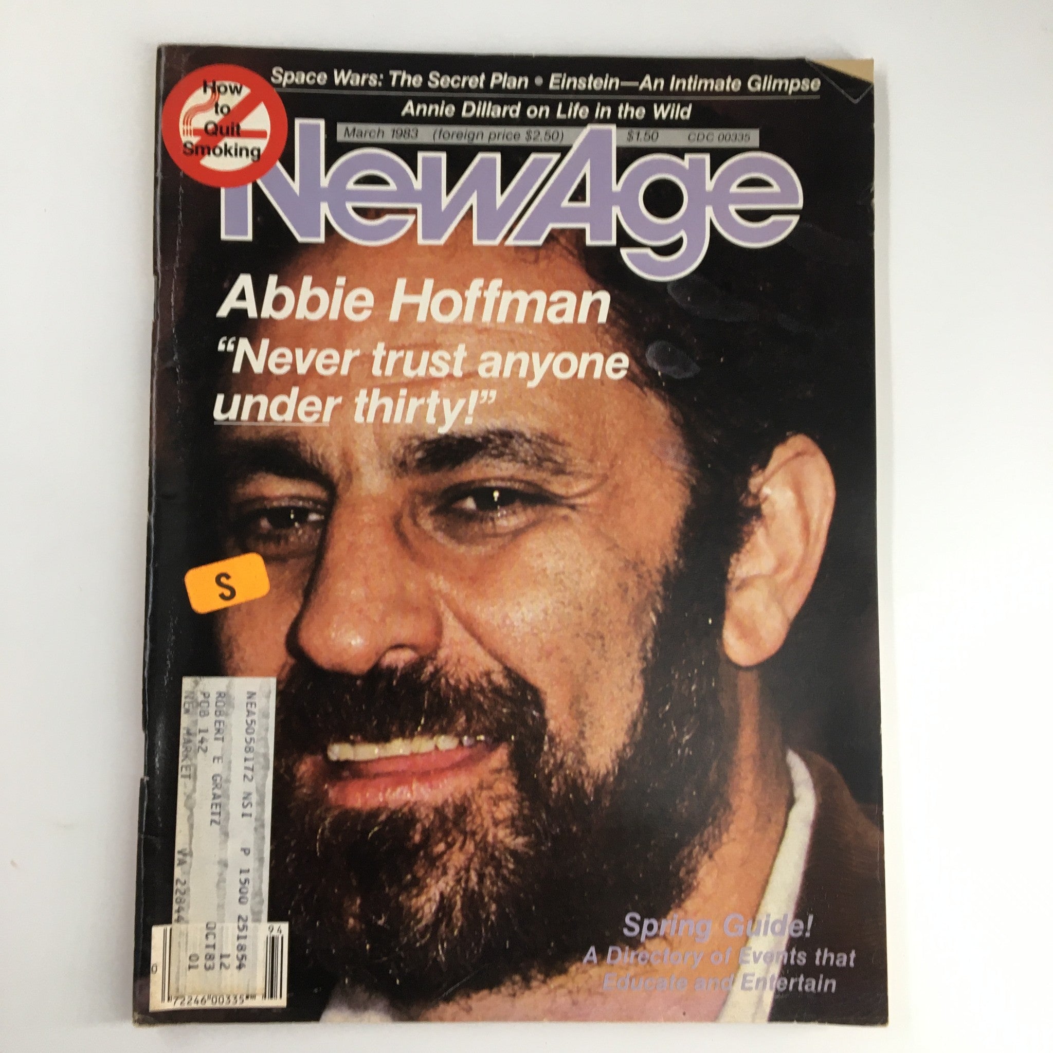 Cover of VTG NewAge Magazine March 1983 featuring Abbie Hoffman with the phrase 'Never Trust Anyone Under Thirty' prominent on the front, showcasing historical counterculture themes.