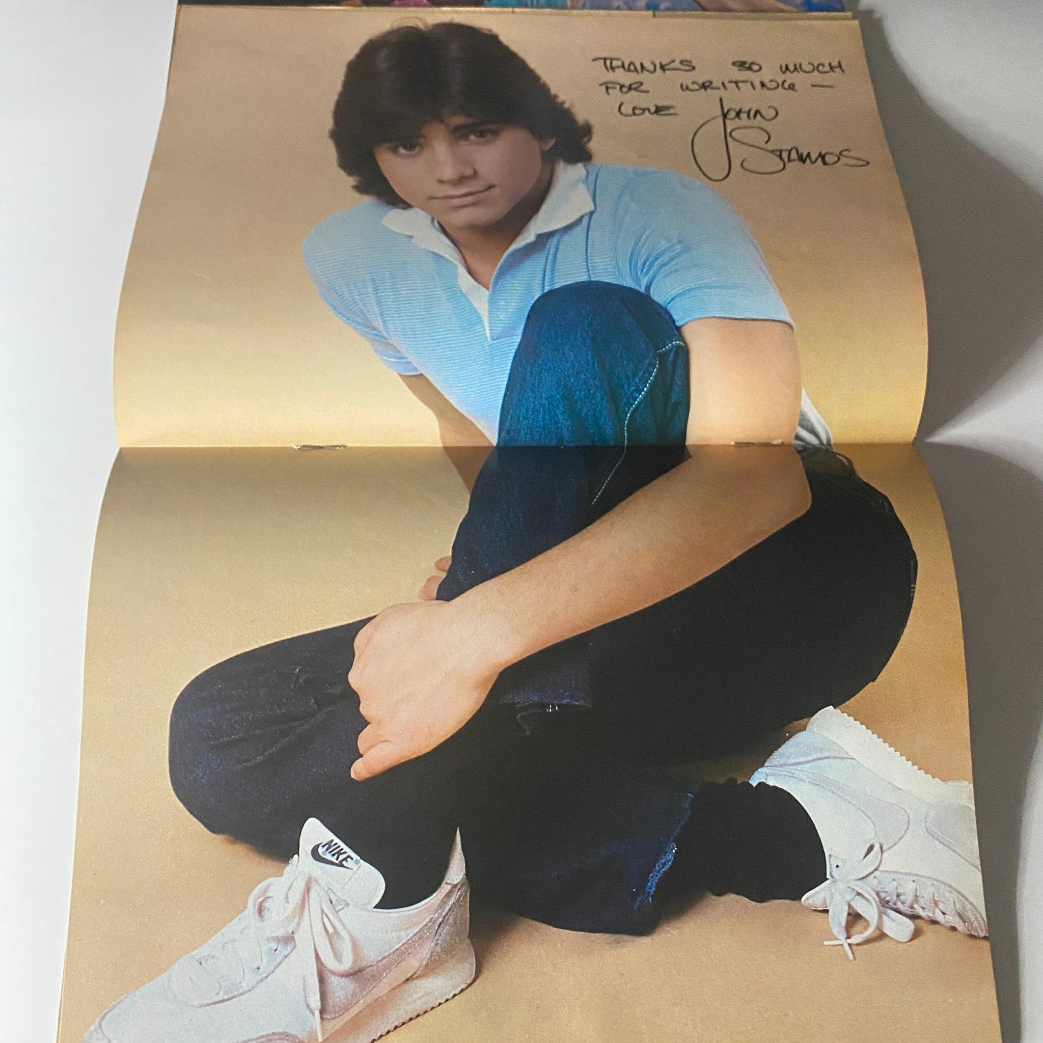 Centerfold poster of John Stamos from Tiger Beat Star Magazine September 1982 with a warm thank you note signed by Stamos.