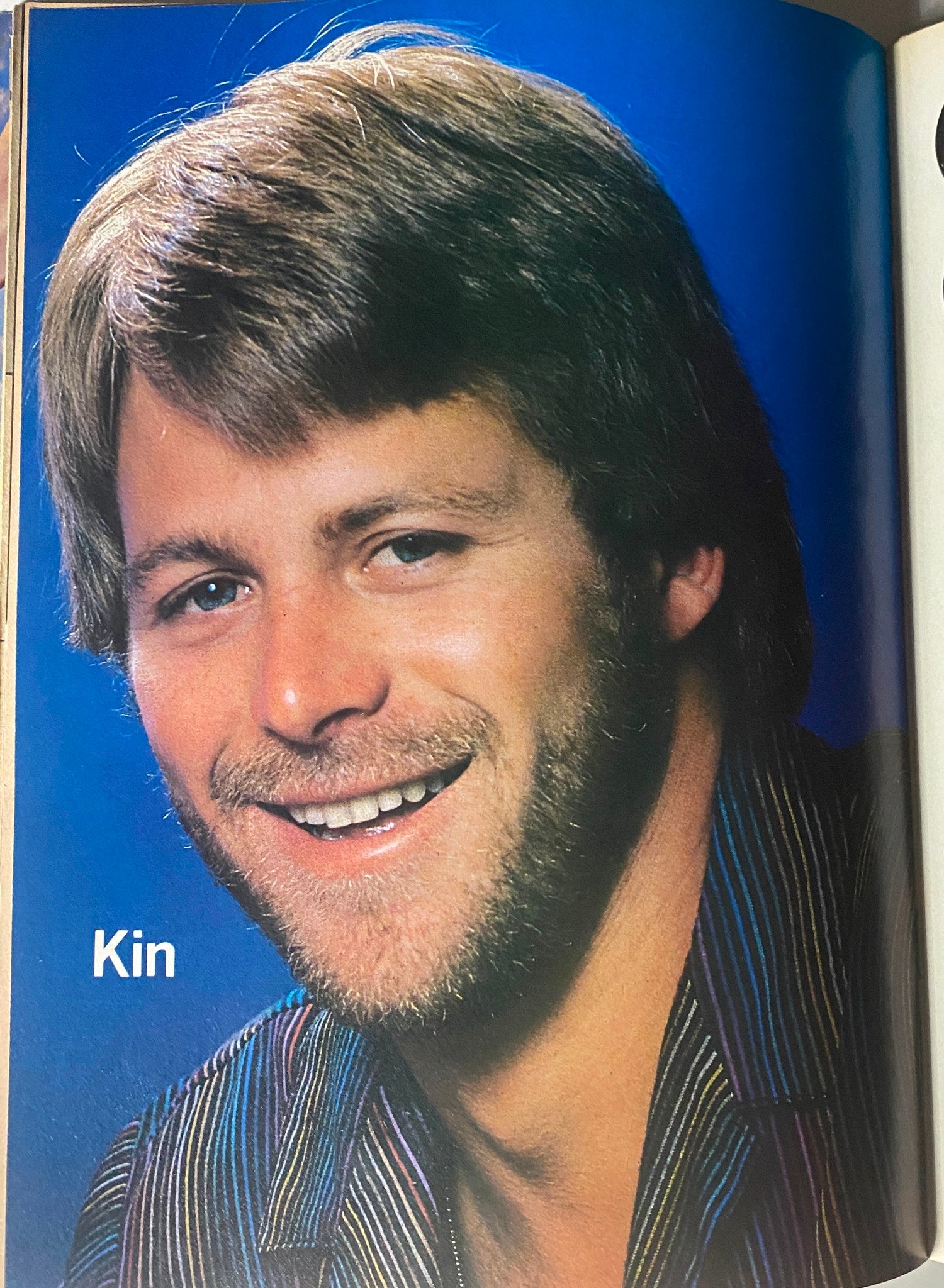 Portrait of Kin from Tiger Beat Star Magazine September 1982 with a friendly smile and stylish striped attire.