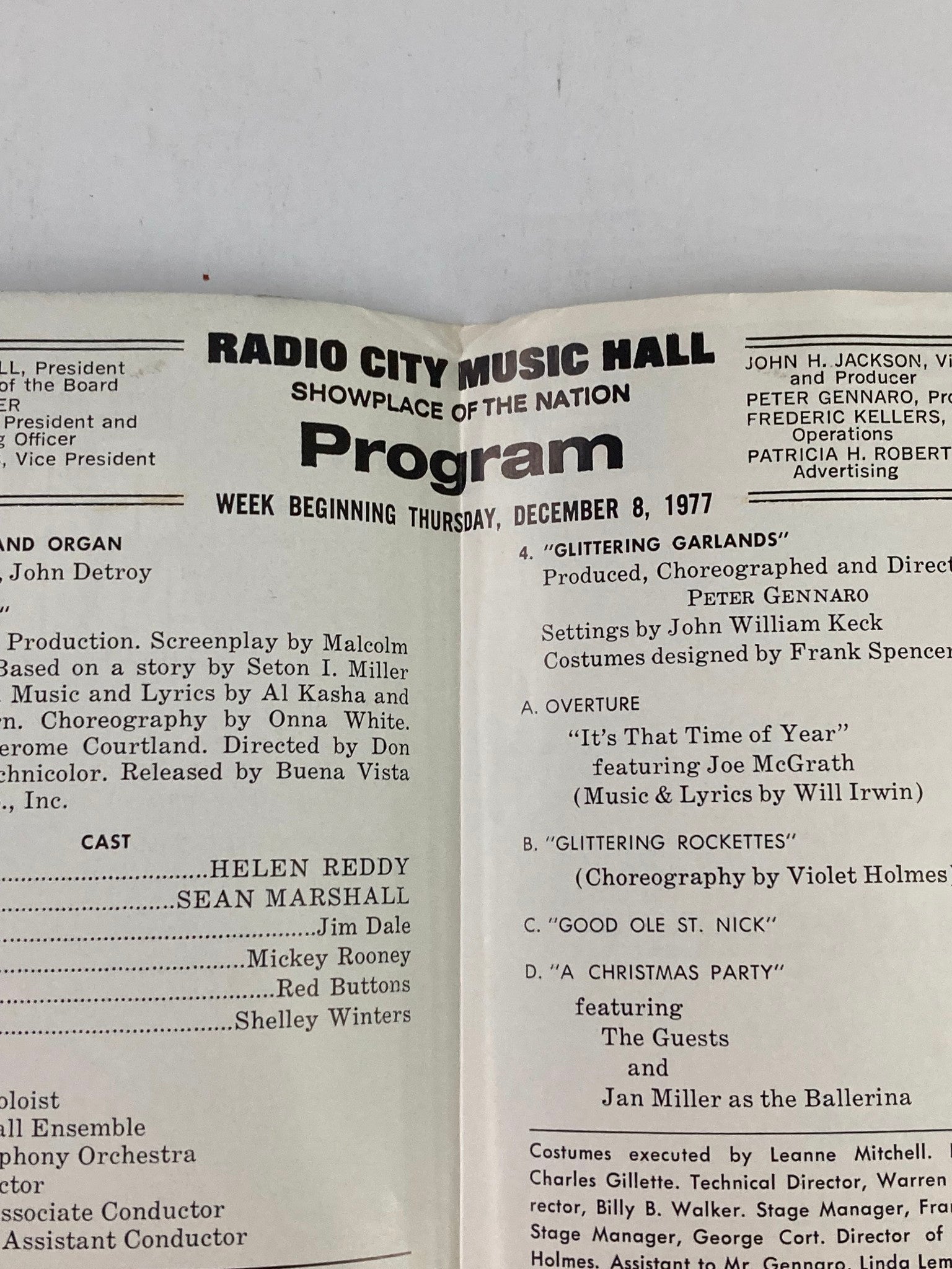Detail view of the 1977 Radio City Hall Program highlighting the cast and musical numbers including Helen Reddy and Sean Marshall in Pete's Dragon.