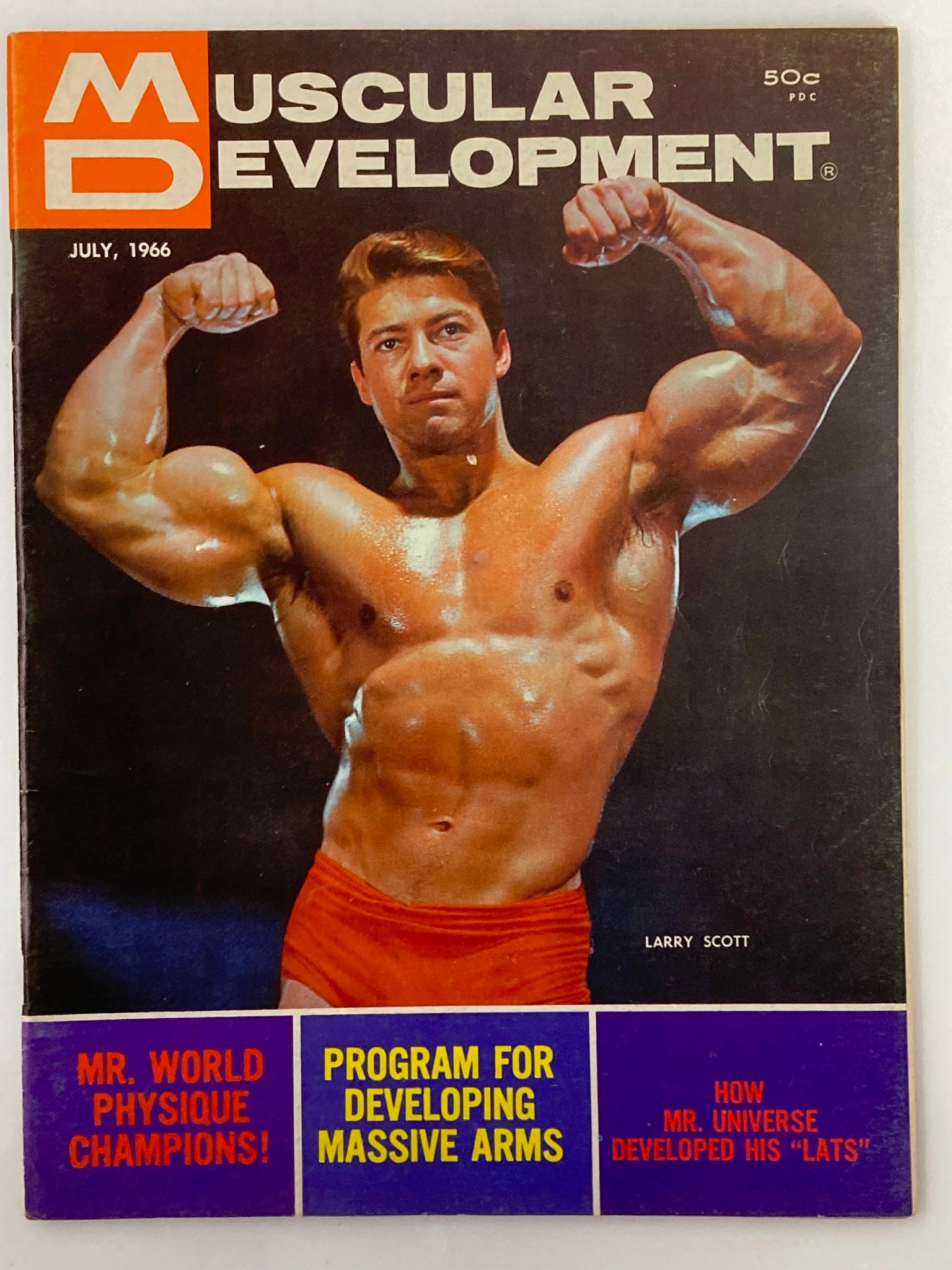 VTG Muscular Development Magazine July 1966, Vol 3 #7 featuring Larry Scott on the cover, showcasing a muscular pose in vibrant colors.