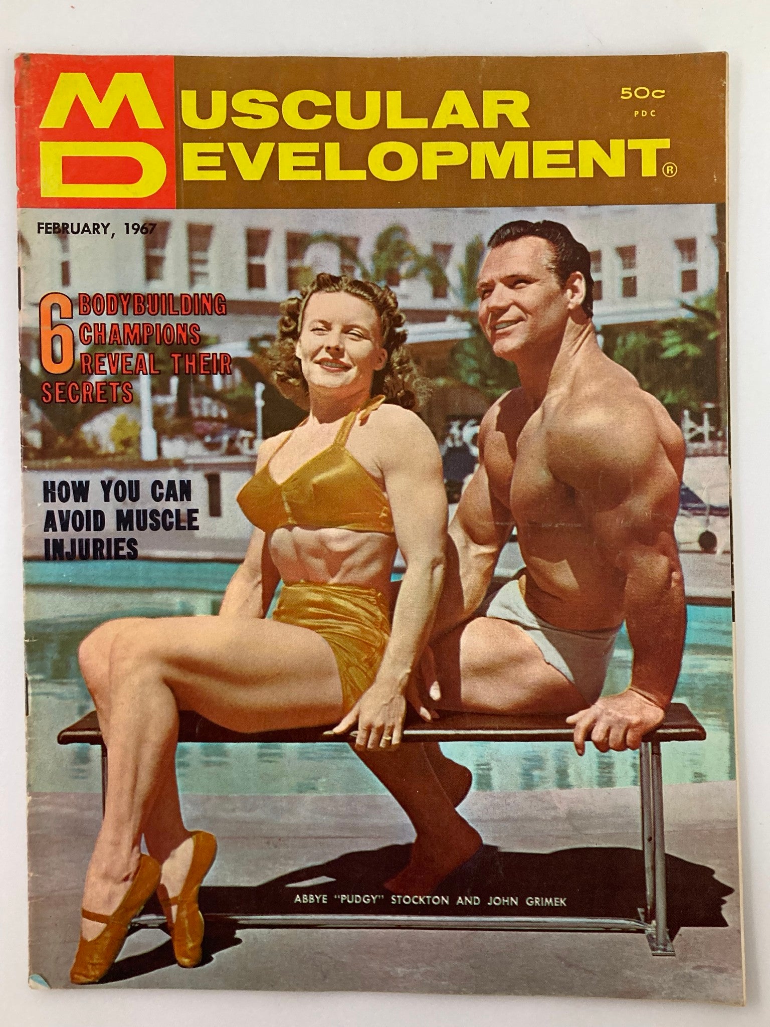 Cover of VTG Muscular Development Magazine February 1967 featuring bodybuilding champions Abbye 'Pudgy' Stockton and John Grimek.