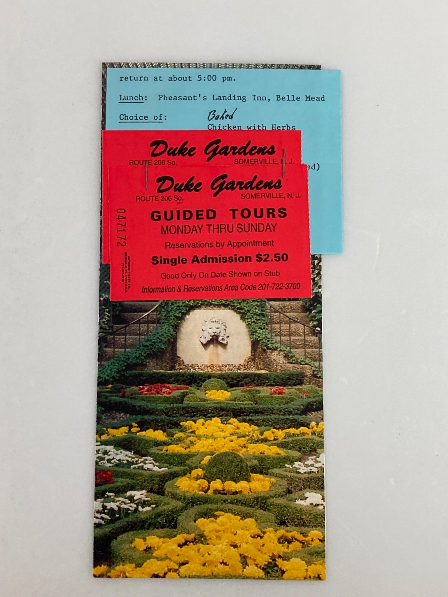 1988 Duke Gardens Foundation Inc. Souvenir Program featuring a scenic view of Duke Gardens with vibrant floral designs and a guided tour ticket attached. The image showcases the beauty of Duke Gardens along with information about guided tours.
