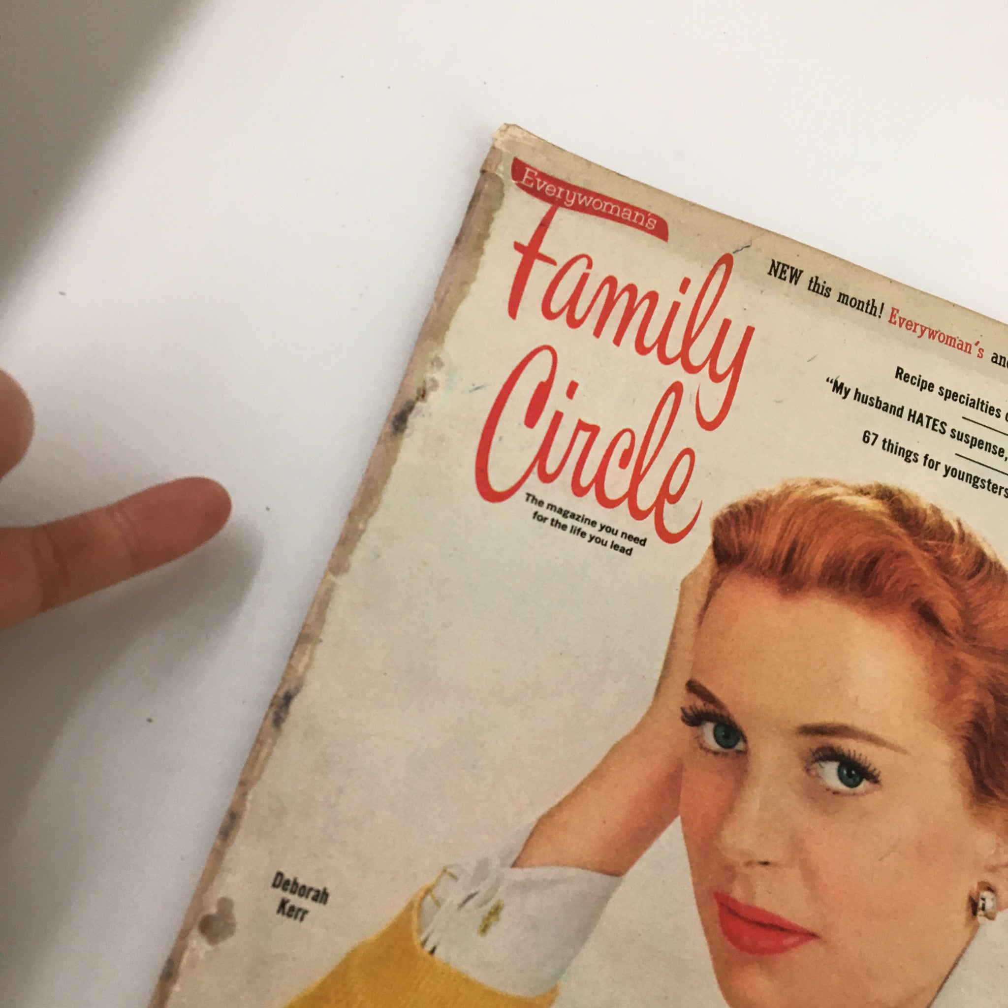 Close-up view of the cover of VTG Family Circle Magazine June 1954 featuring Deborah Kerr, highlighting the magazine's vintage design and nostalgic theme.