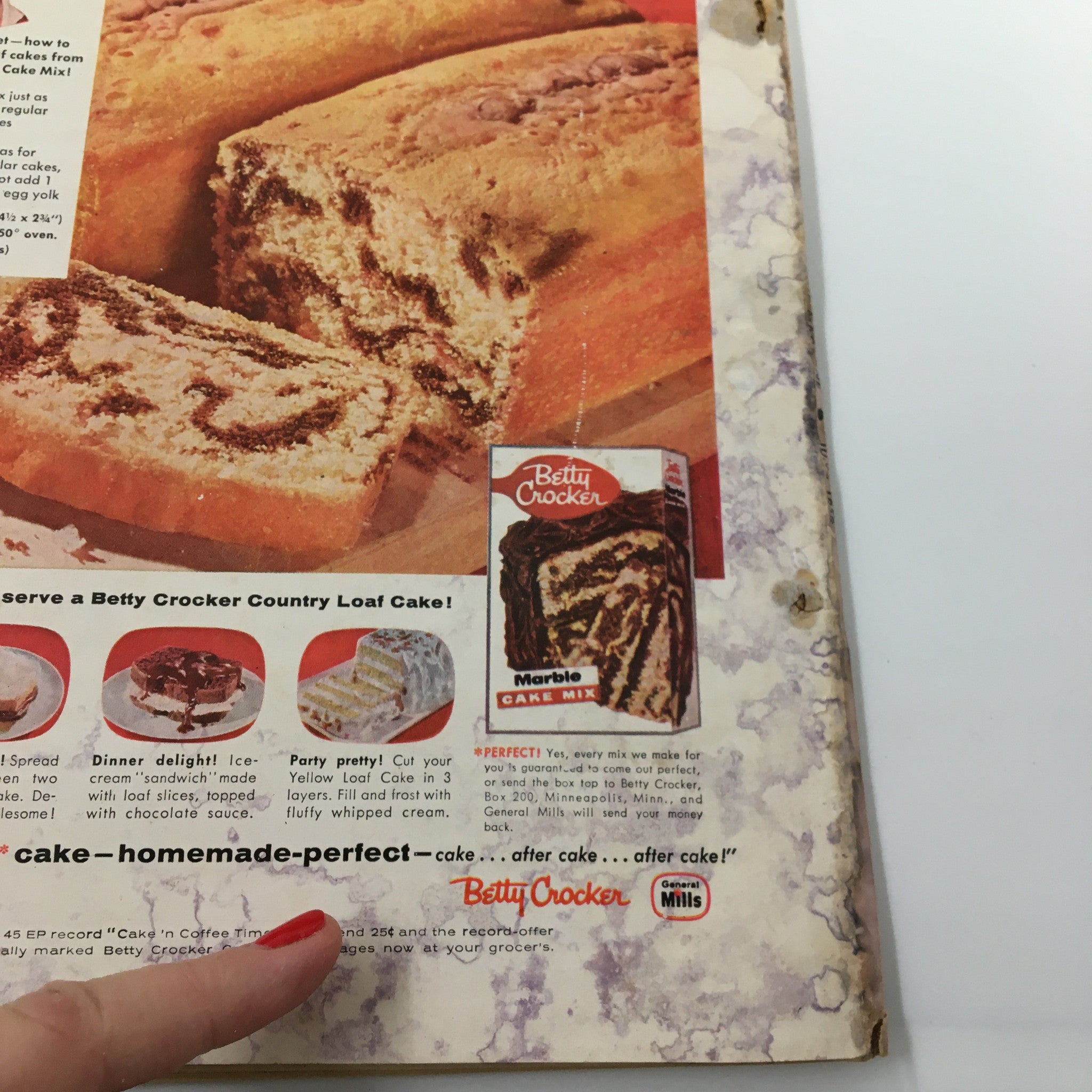 Advertisement for Betty Crocker Country Loaf Cake in Family Circle Magazine June 1954, displaying a delicious marble cake and recipe tips, emphasizing nostalgic cooking and baking traditions.