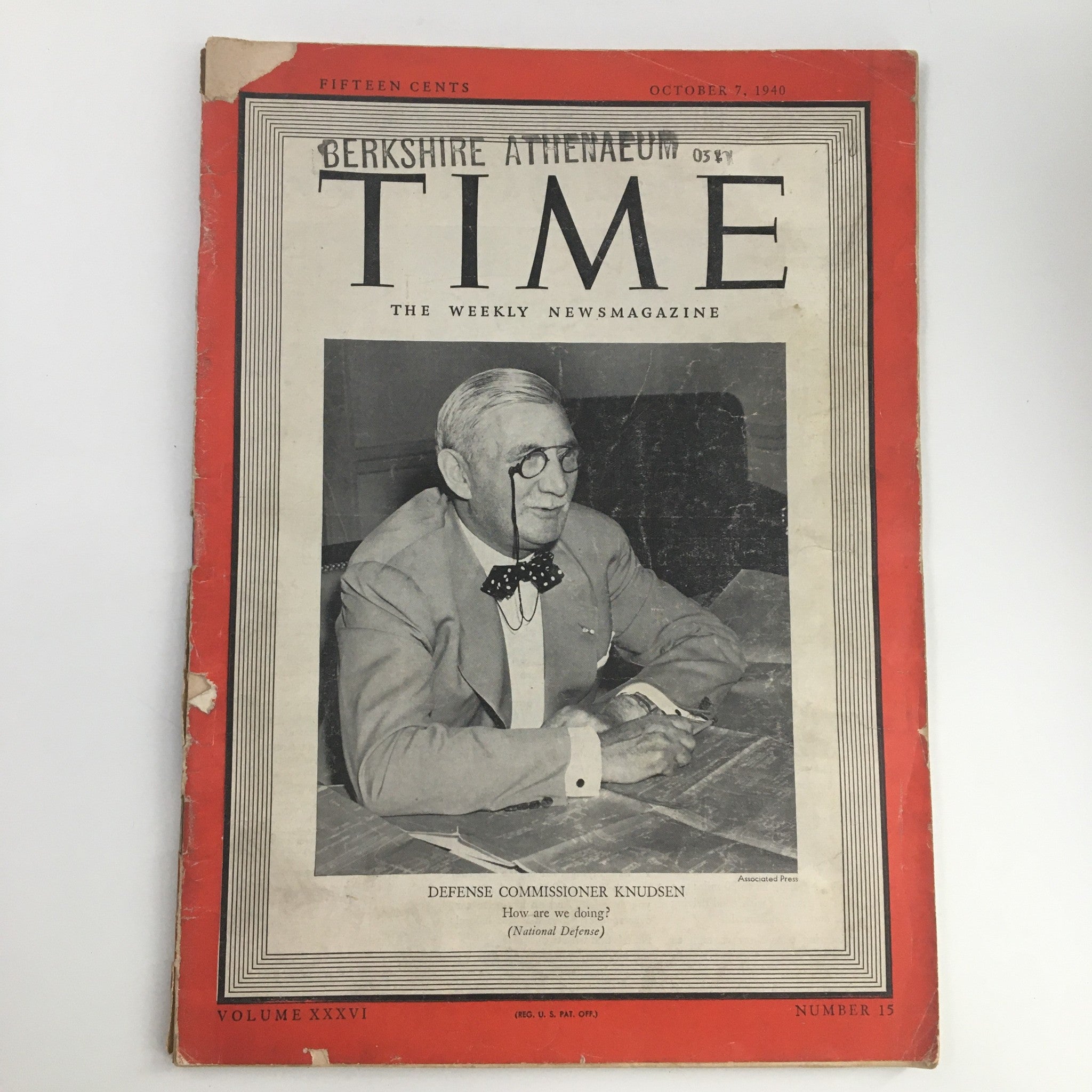 Time Magazine October 7 1940, Vol 36 #15 cover featuring Defense Commissioner William S. Knudsen seated at a table, providing a glimpse into historical events before World War II.
