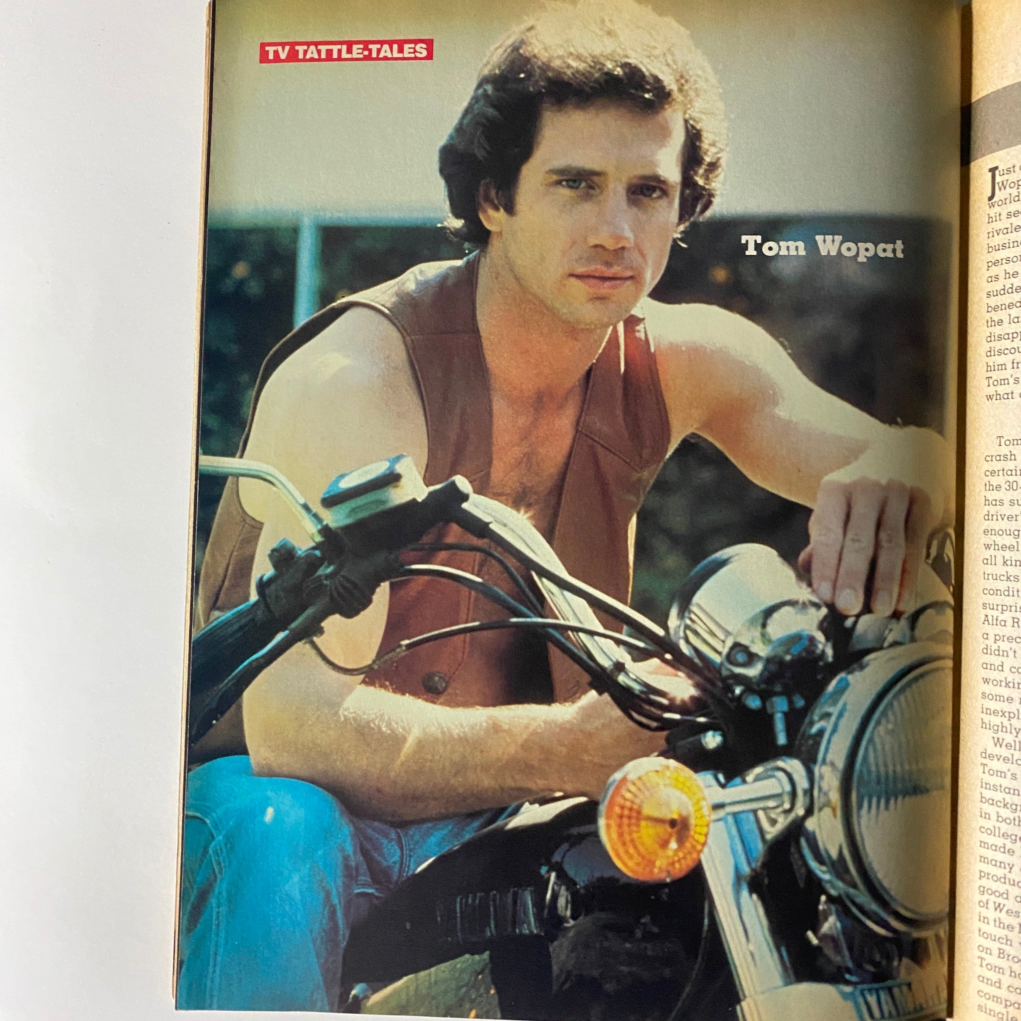 Tom Wopat featured in the Fall 1981 edition of 16 Magazine TV & Movie Tattle-Tales, posing on a motorcycle reflecting the rugged charm of '80s celebrities.