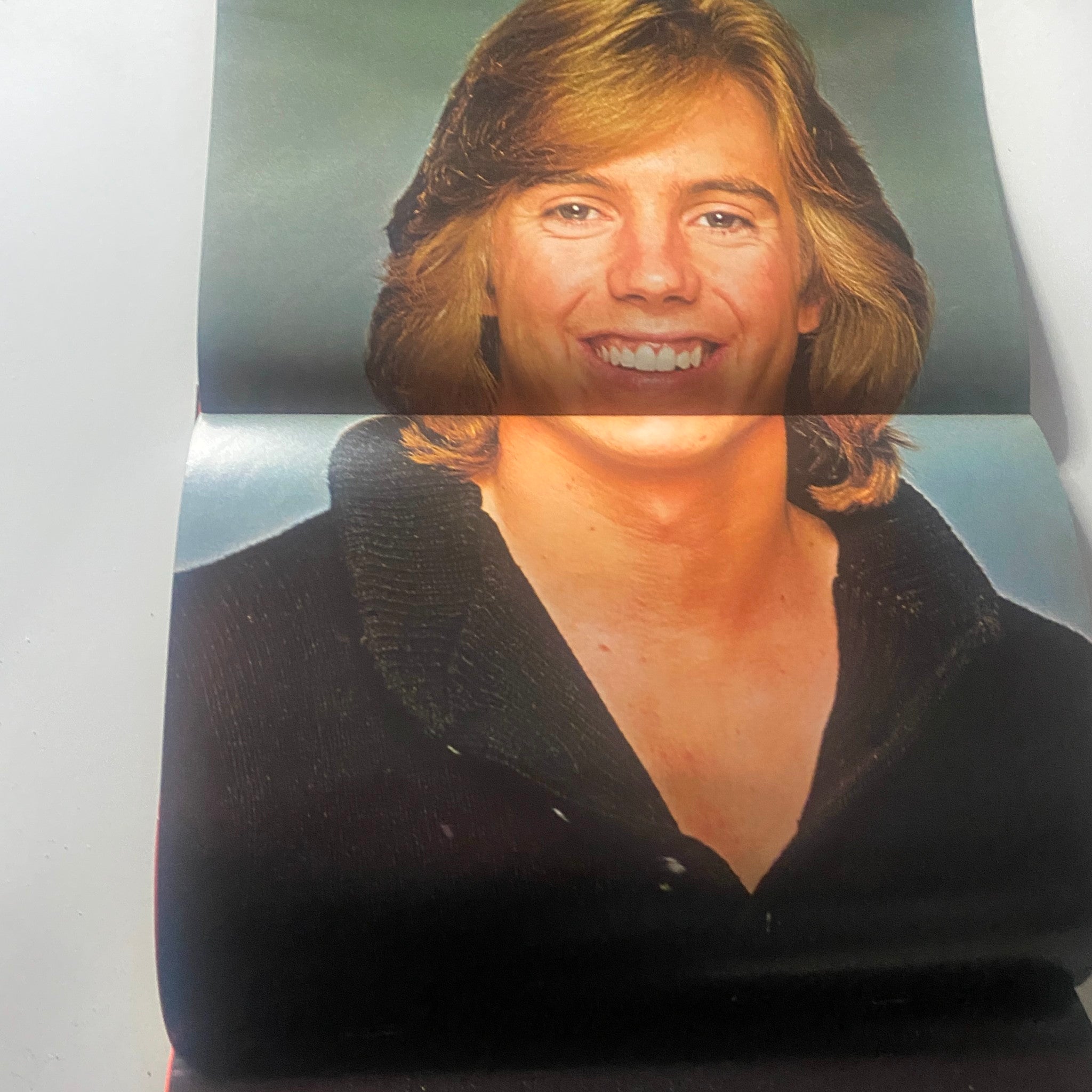 Double-page poster in 16 Magazine June 1978 showcasing a smiling male star, enhancing the nostalgia of 1970s pop culture.