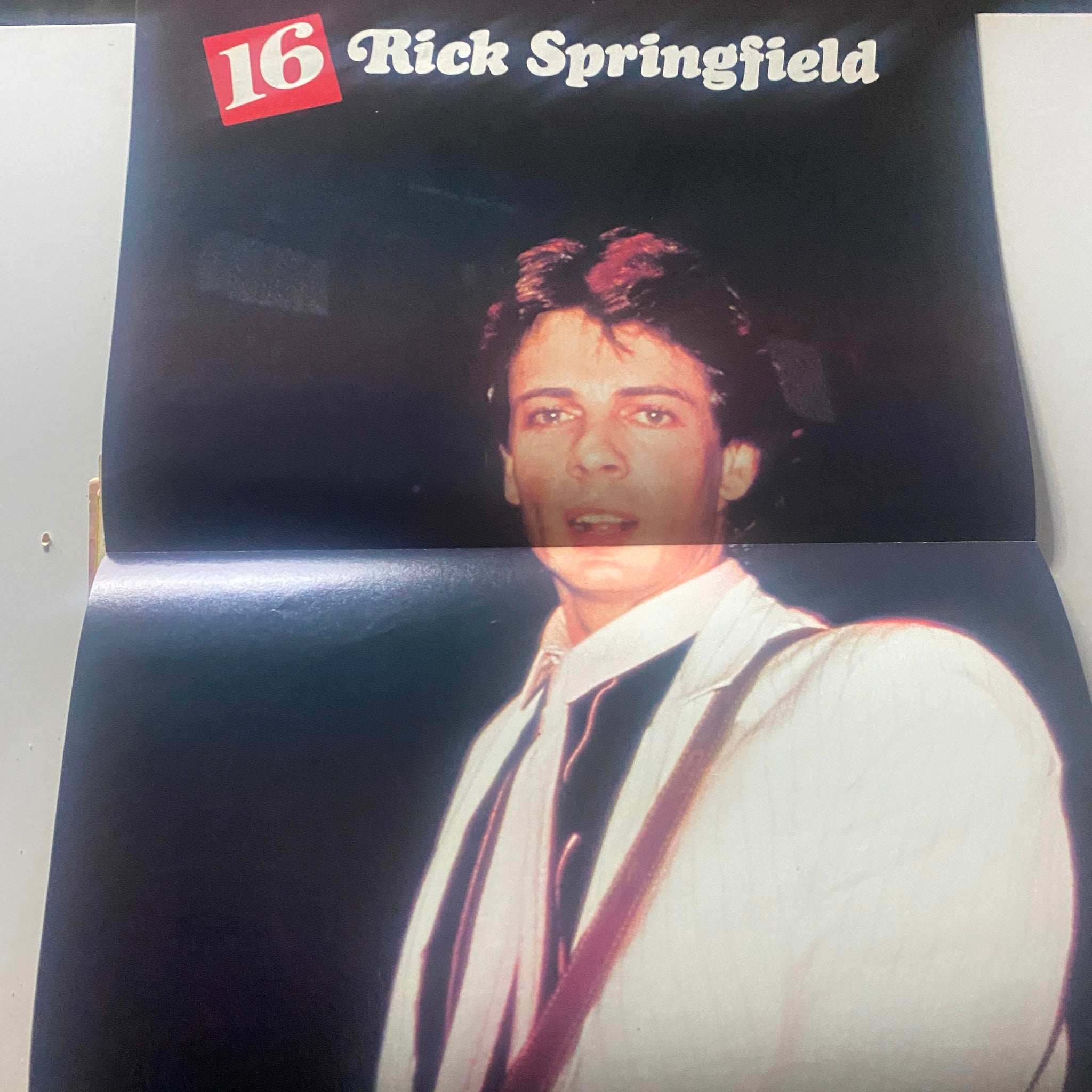16 Magazine October 1982 poster of Rick Springfield, showcasing the iconic musician in a vintage magazine format.