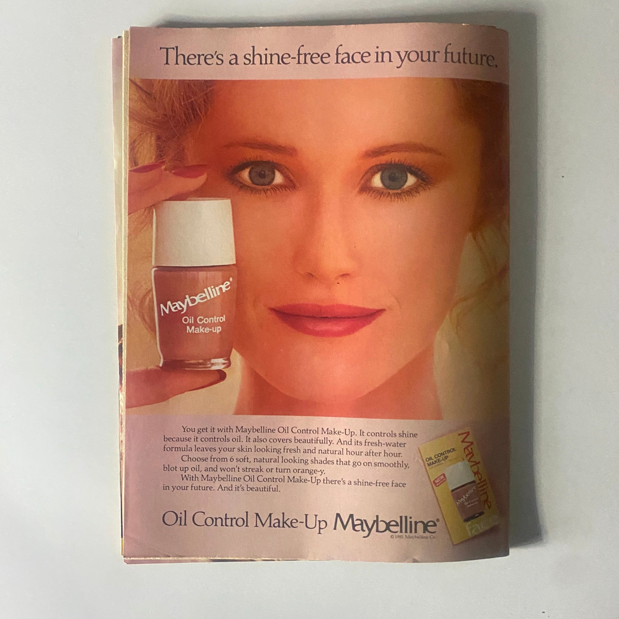 16 Magazine October 1982 advertisement for Maybelline Oil Control Make-Up, promoting beauty products from the 1980s.