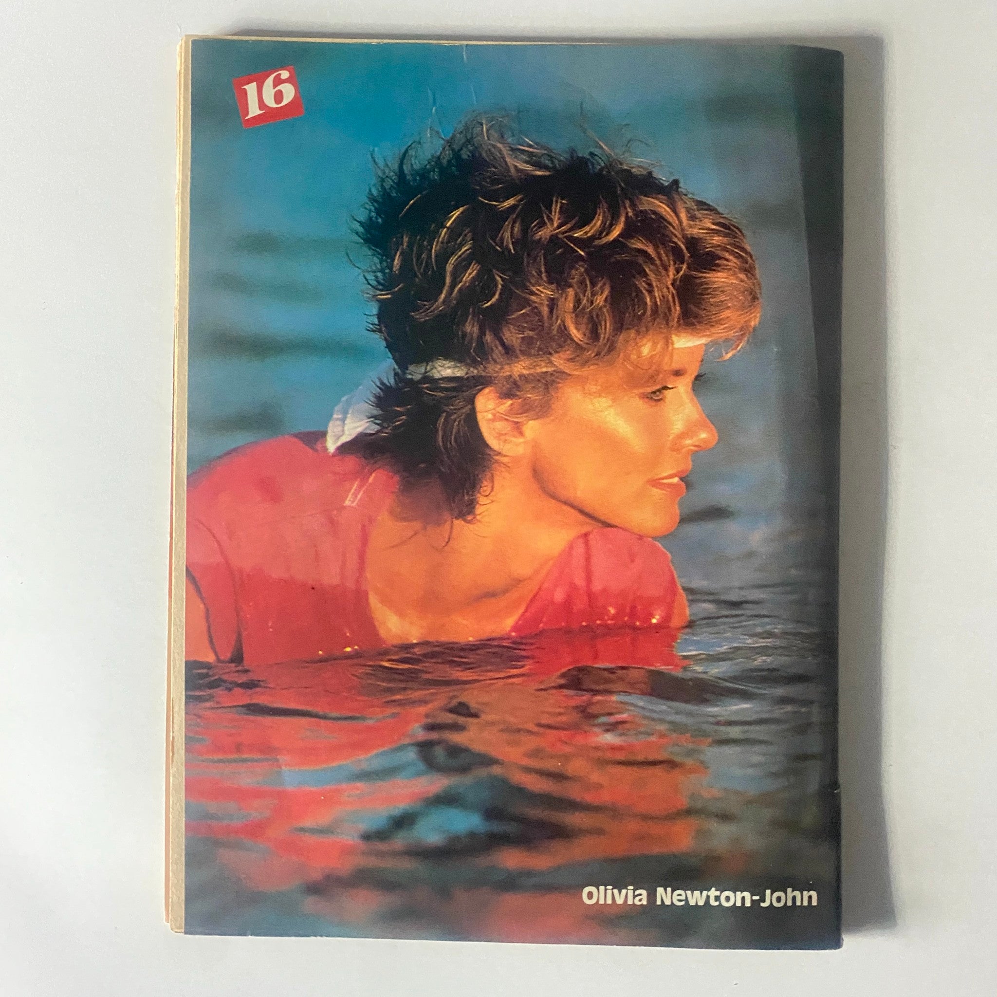 Vintage 16 Magazine featuring Olivia Newton-John on the cover, July 1982 issue. A collectible piece celebrating 80s music and culture.