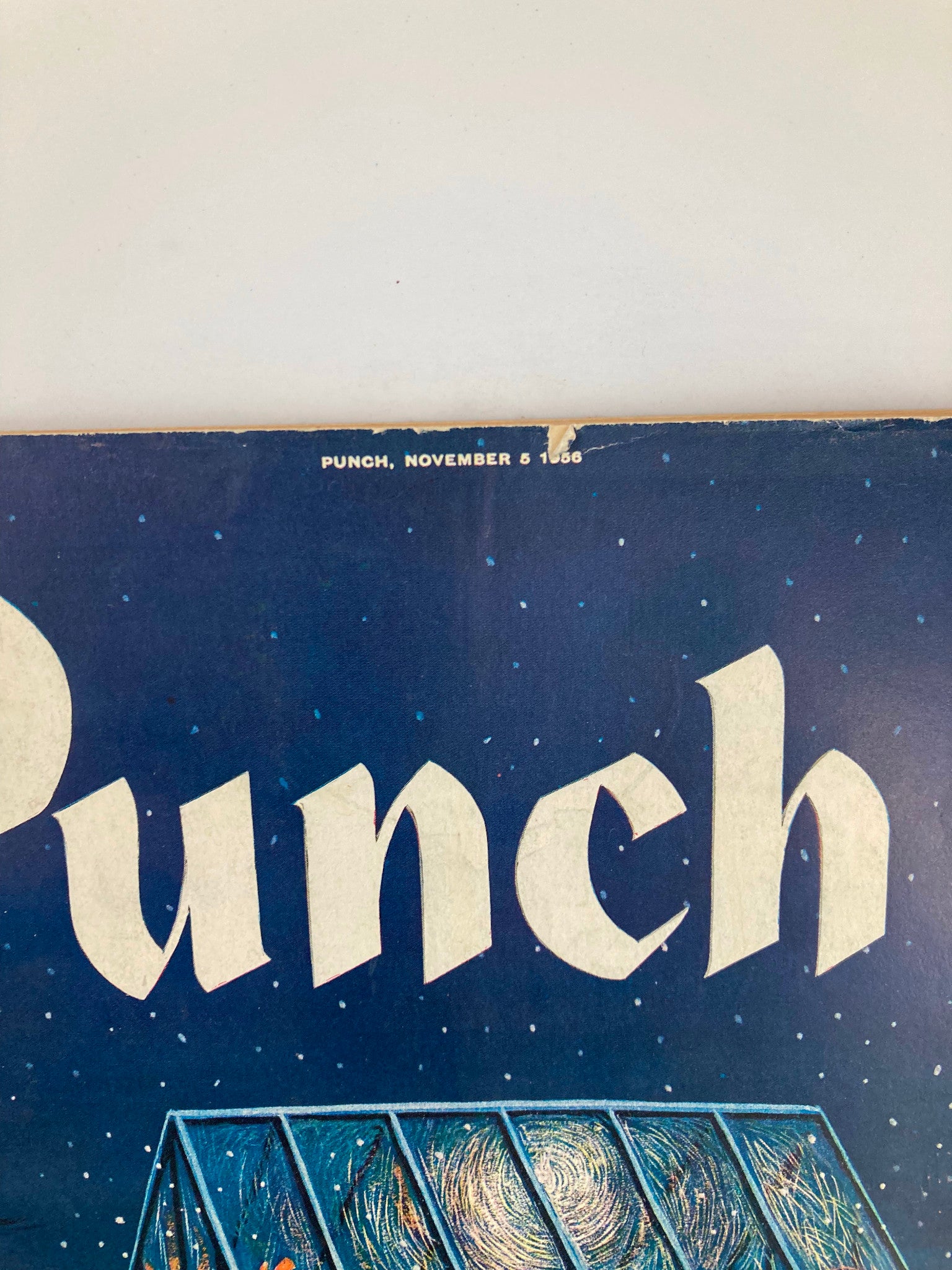 Close-up of the top portion of the VTG Punch Magazine from November 5, 1956, displaying the title 'Punch' and the publication date, with a blue background and details of the almanack.