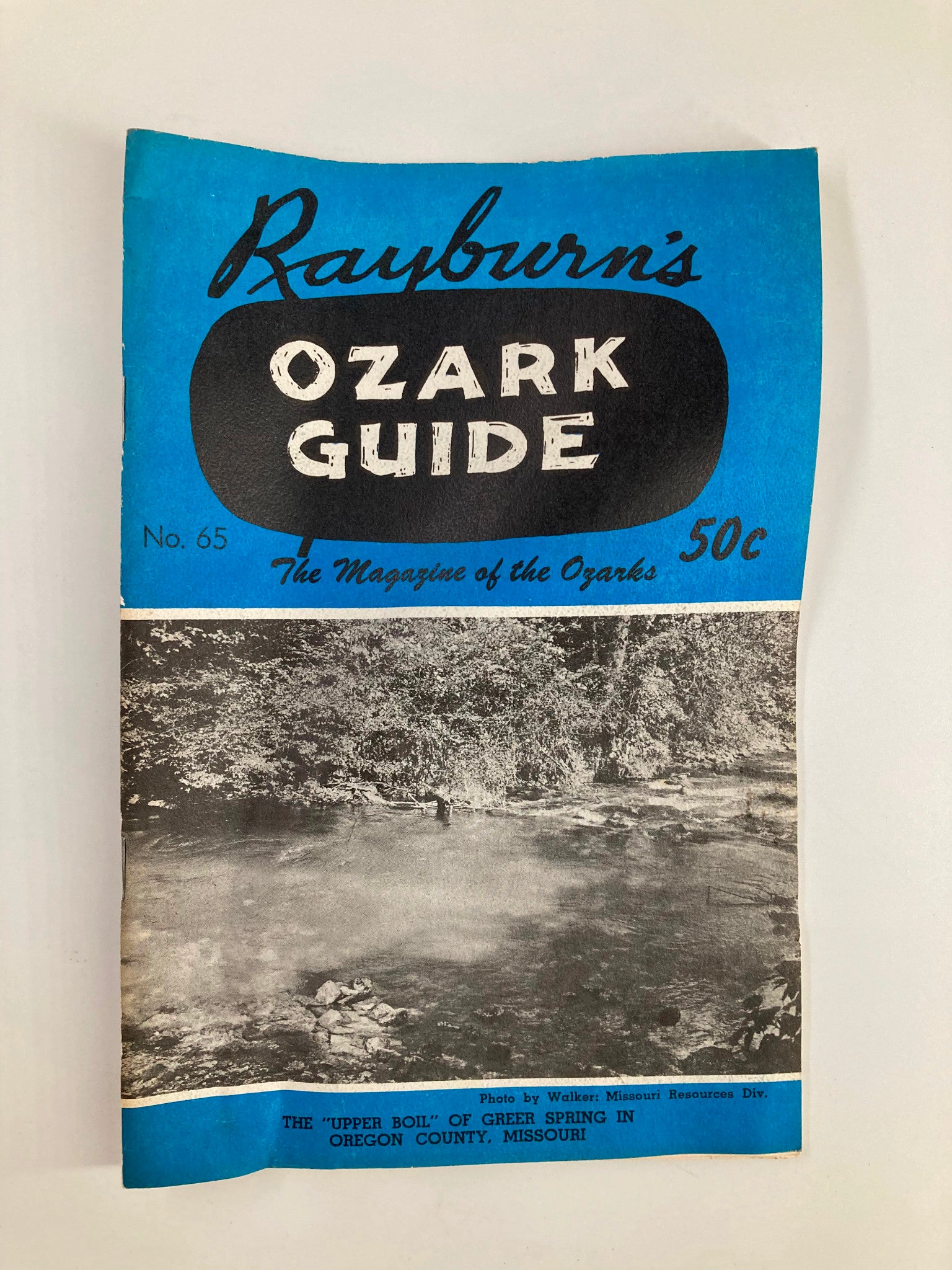 Cover of Rayburn's Ozark Guide Magazine July 1960, featuring a scenic photo of the Upper Boil in Greer Spring, Oregon County, Missouri, with vintage-style graphics and a price tag of 50 cents.