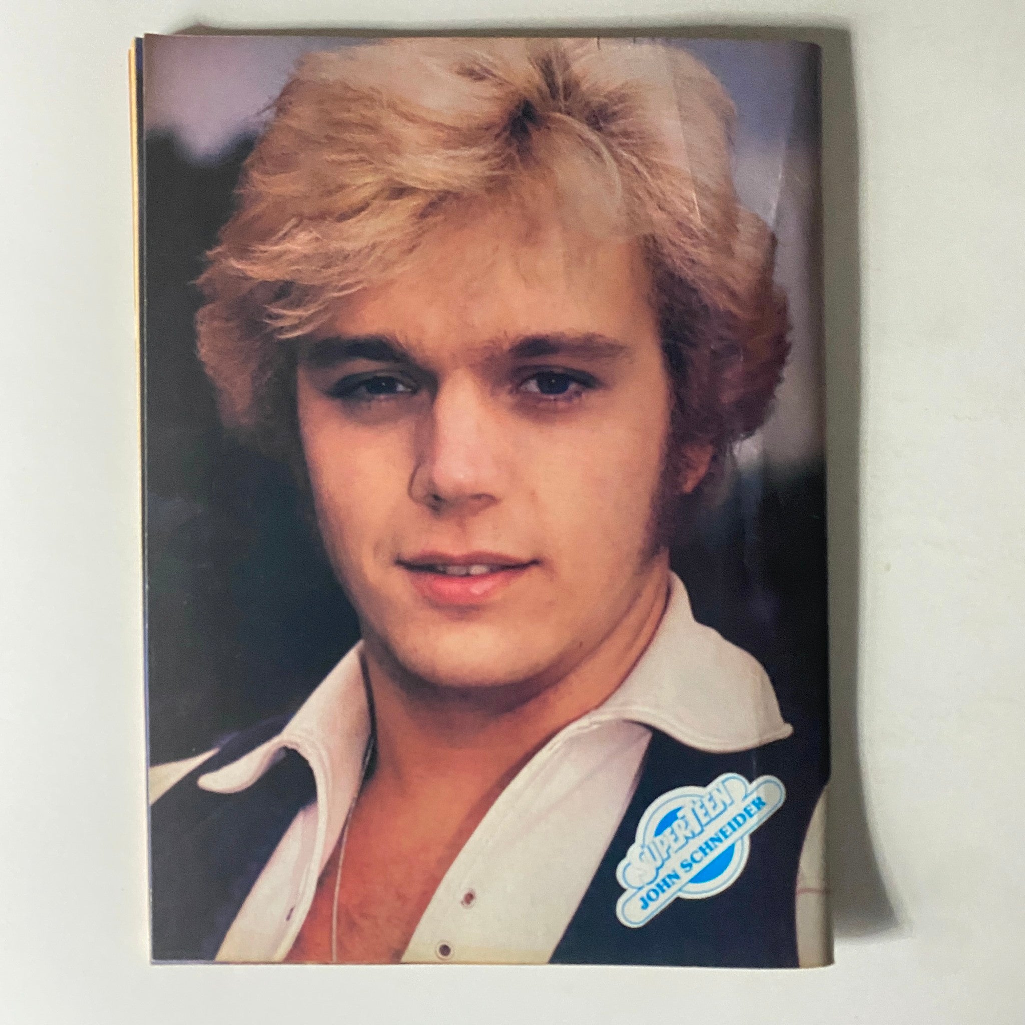 SuperTeen Magazine November 1980 featuring a vintage photo of John Schneider with a youthful appearance and a charming smile, showcasing the essence of 1980s pop culture.