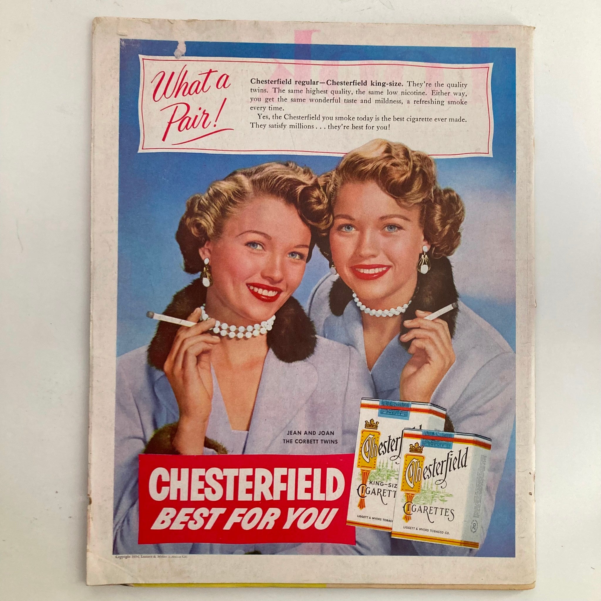 Back page advertisement from VTG Look Magazine October 5, 1954, featuring two smiling women promoting Chesterfield cigarettes with the slogan 'Best for You'.