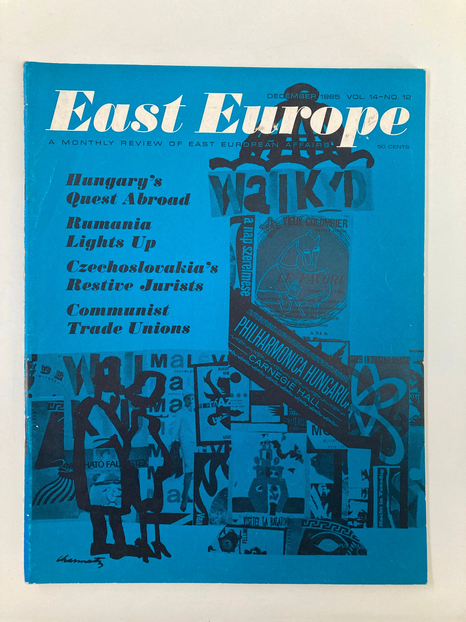 Cover of VTG East Europe Magazine December 1965, featuring the title 'Hungary's Quest Abroad' and vibrant blue background, showcasing articles on Eastern European affairs.