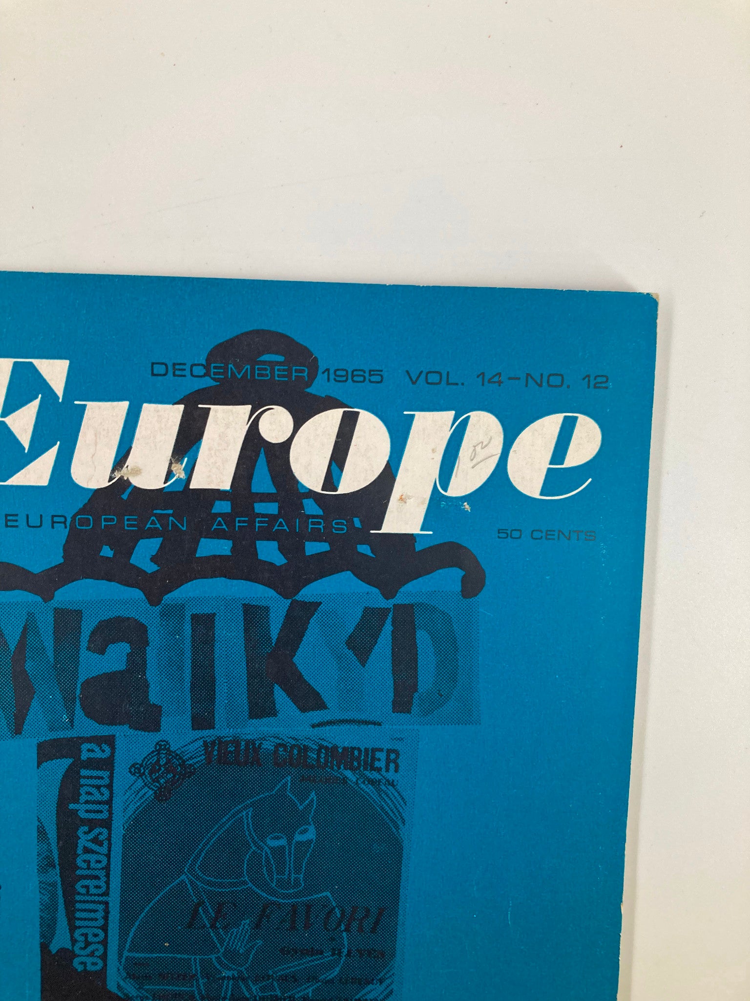 Close-up shot of the VTG East Europe Magazine December 1965 cover, detailing the title and subtitle, highlighting topics of Hungary and Eastern European culture.