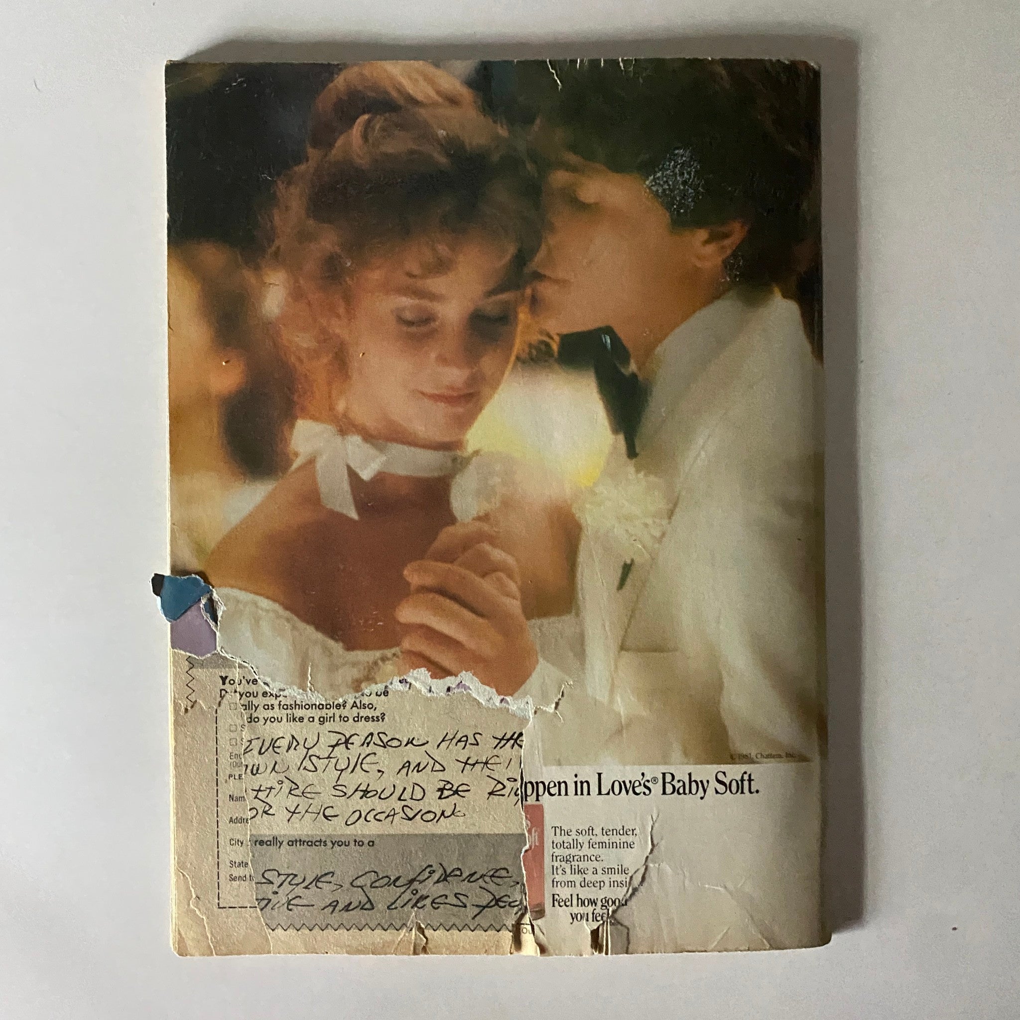 Back cover of Tiger Beat Magazine January 1982 showcasing a romantic scene with a couple, featuring a handwritten note.