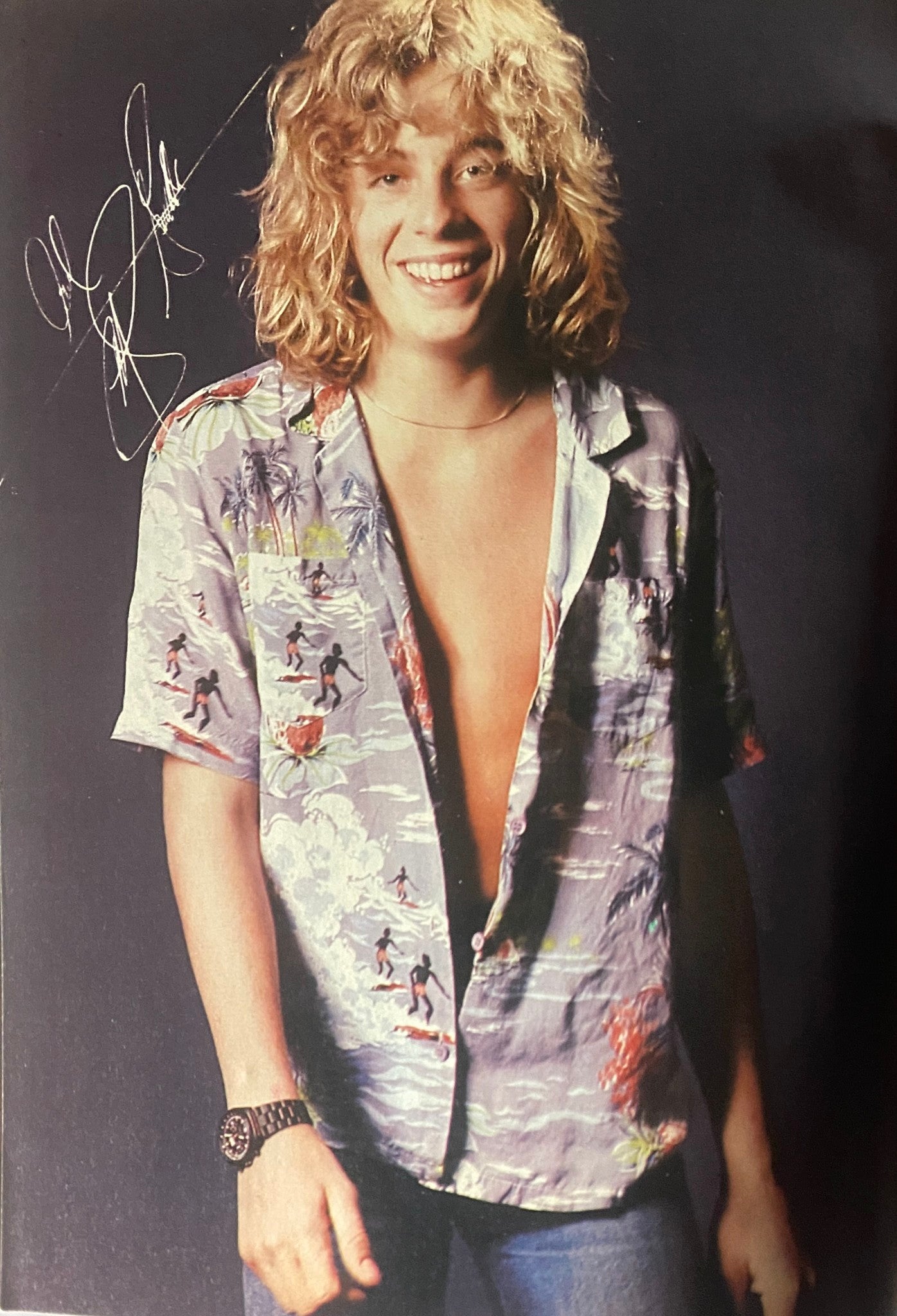 A vibrant image of Michael Damian smiling, wearing a casual floral shirt, featured in Tiger Beat Magazine May 1981.