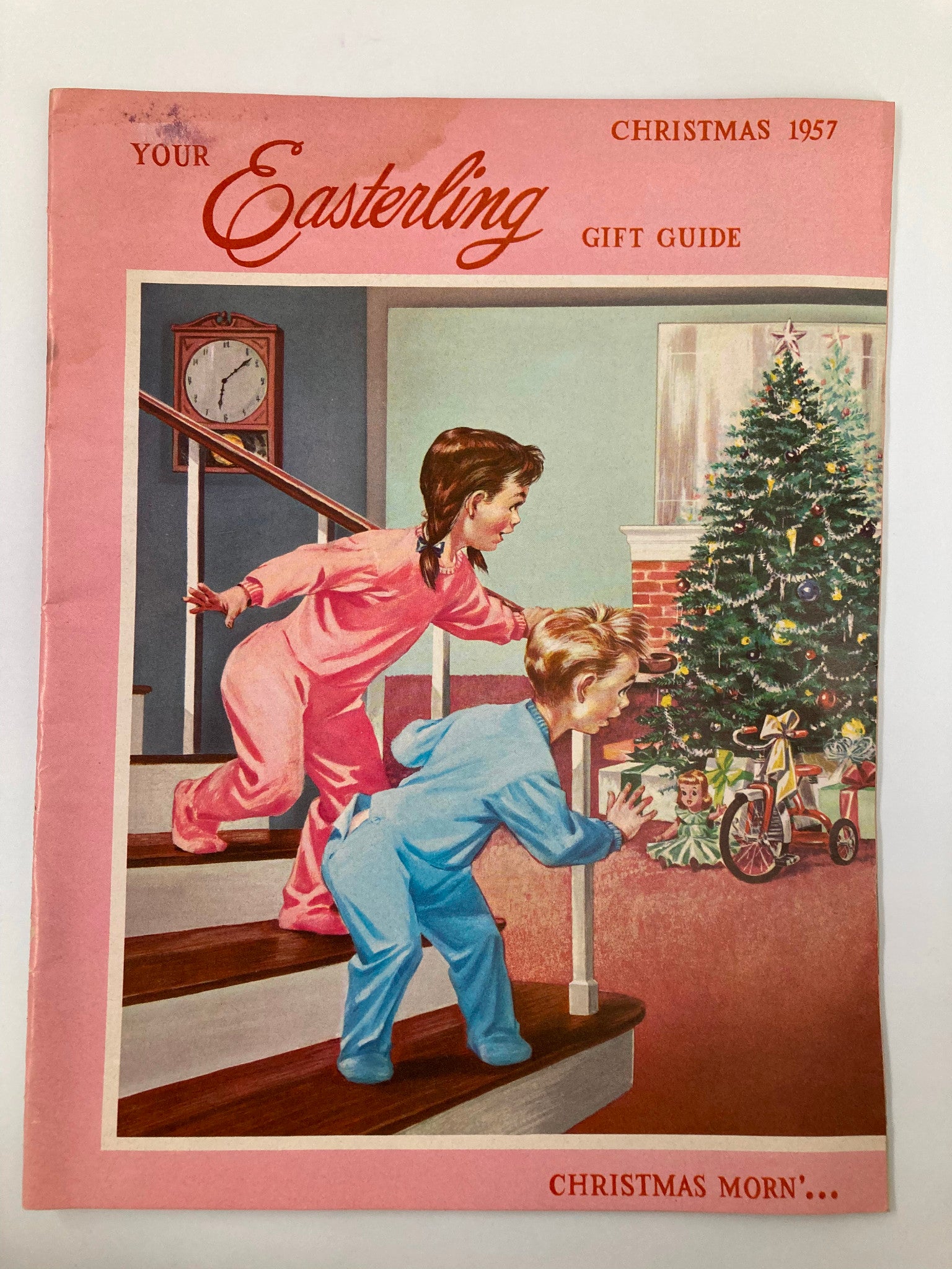 Vintage catalog cover featuring children in pajamas excited for Christmas, titled 'VTG Christmas 1957 Your Easterling Gift Guide for Christmas Morn'.
