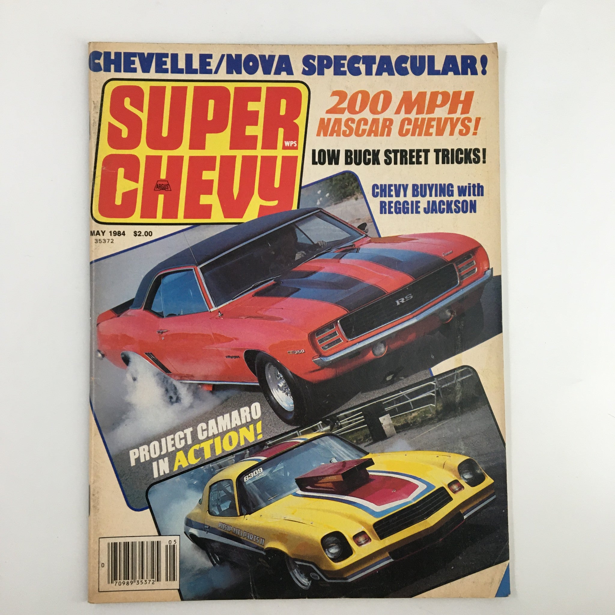 Cover of VTG Super Chevy Magazine May 1984 featuring a vibrant design showcasing classic Chevrolets, including a red Camaro RS and a yellow modified car. Highlights include 'Chevy Buying with Reggie Jackson' and '200 MPH NASCAR CHEVYS'.