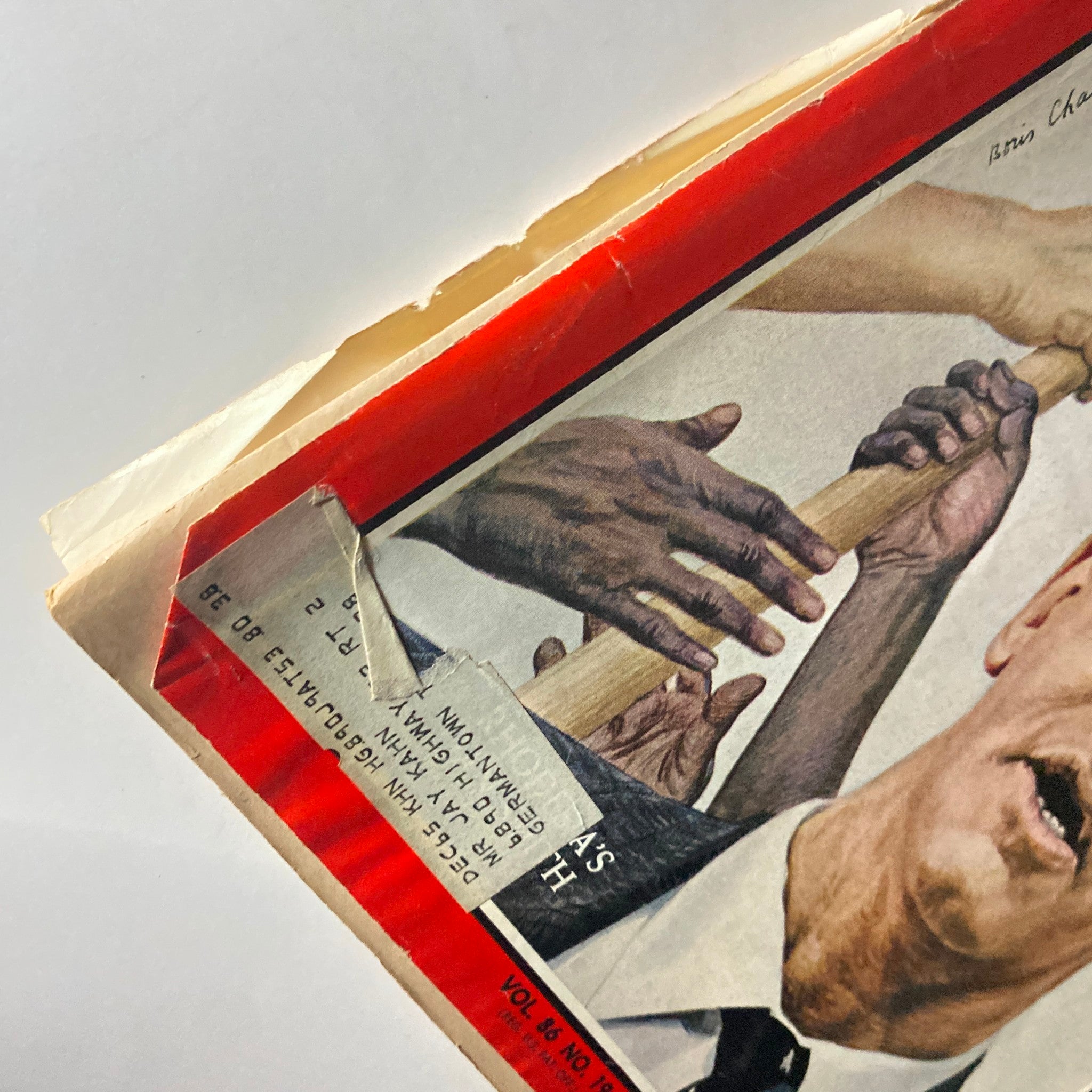 Close-up of the cover of Time Magazine November 5, 1965, showing a detailed view of Ian Smith, Prime Minister of Rhodesia, alongside hands gripping a stick, emphasizing themes of racial tensions and political strife.