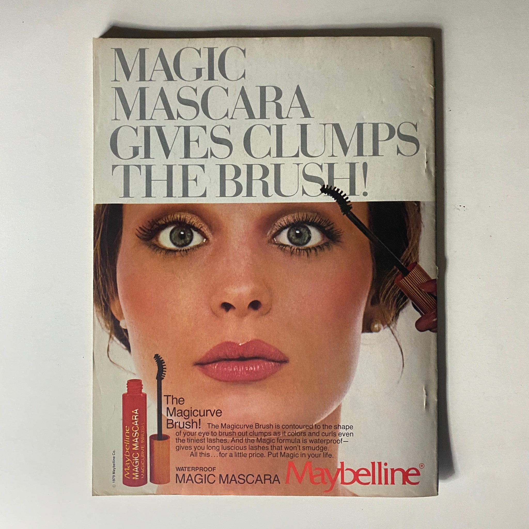 Rona Barrett's Hollywood Magazine July 1980 advertisement for Maybelline's Magic Mascara, highlighting the 'Magicurve Brush' for clump-free application.