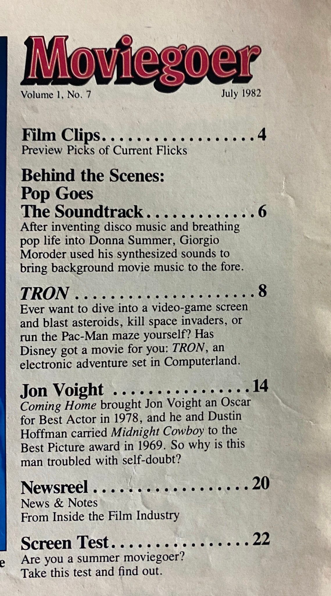 Cover page of Moviegoer Magazine July 1982 featuring the title and article highlights, including Jon Voight and the film TRON.
