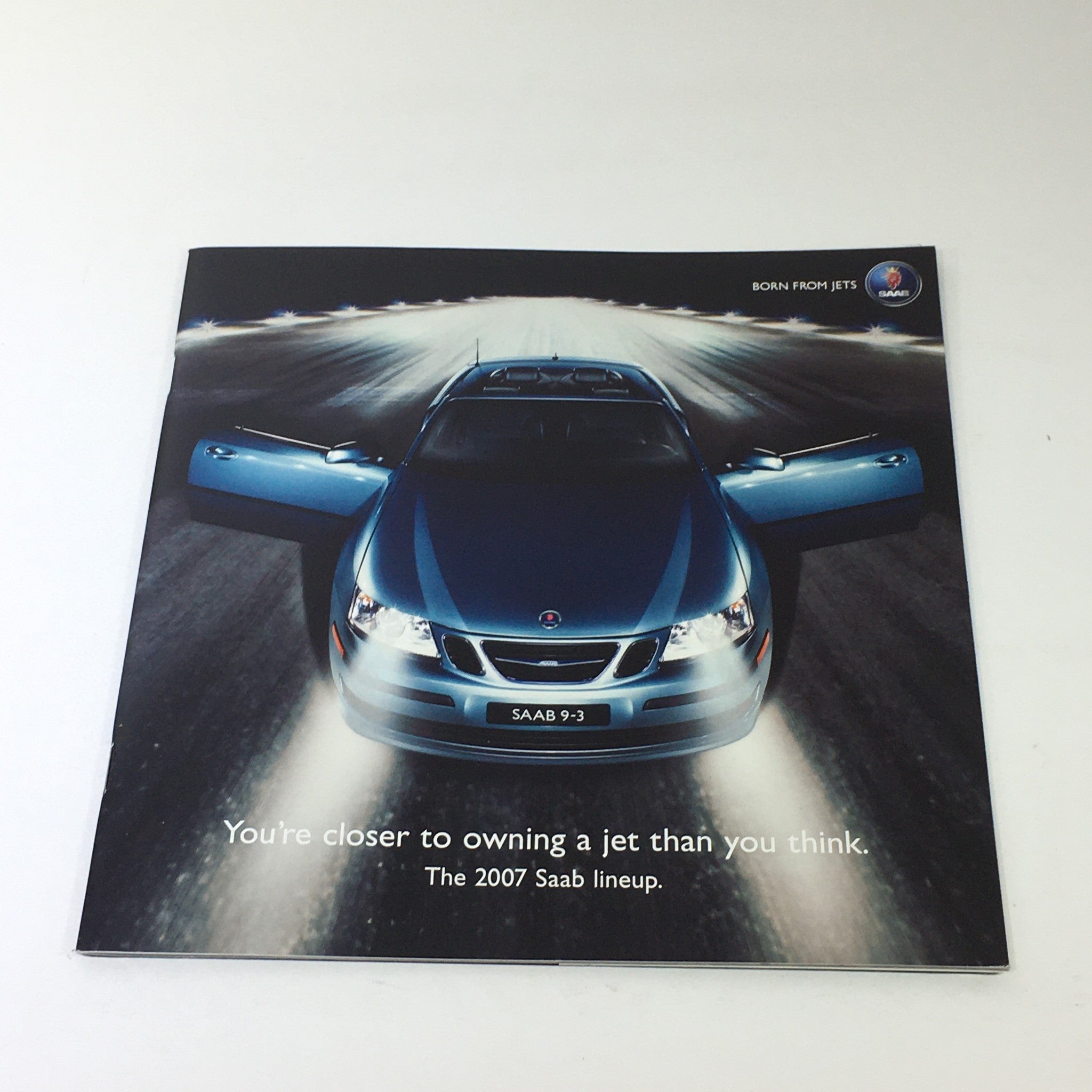 2007 Saab Lineup 93 Sport Sedan Dealership Car Auto Brochure Catalog cover featuring a sleek Saab 9-3 with open doors on a night road.