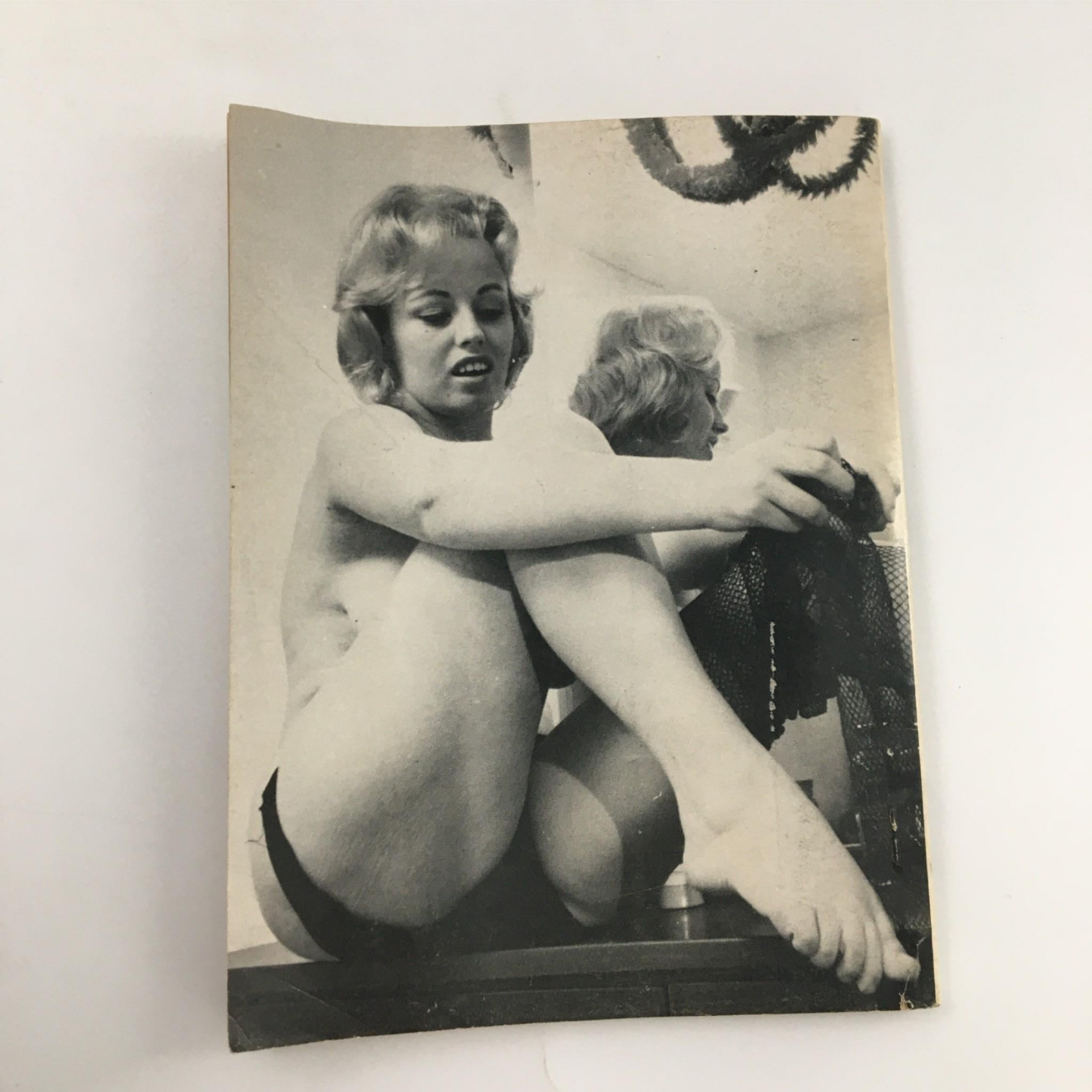Black and white photograph from PIC Magazine December 1972, featuring a young woman in a provocative pose, corresponding with the magazine's adult themes.