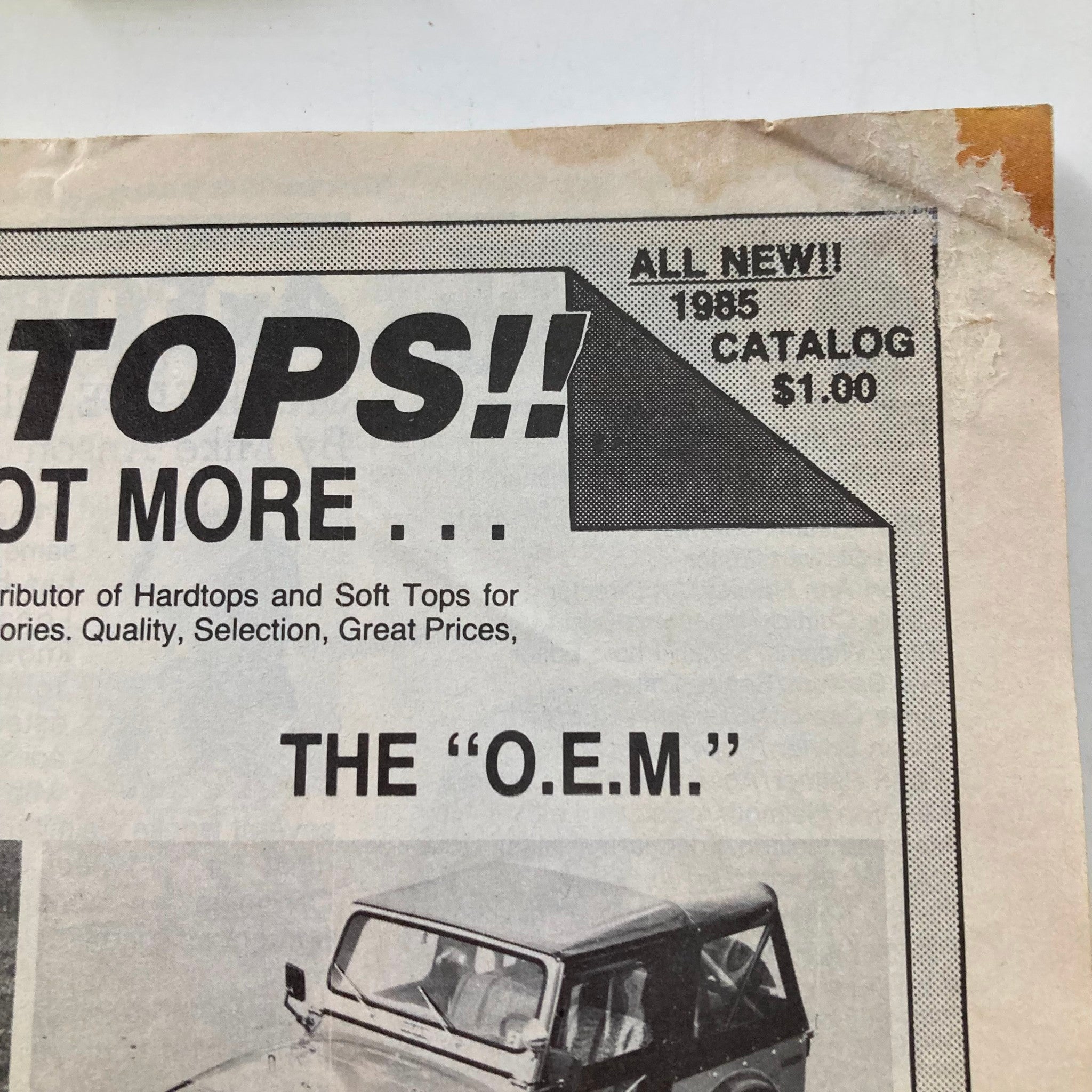 Detail shot of a page from VTG Petersen's 4 Wheel & Off-Road Magazine, October 1985, showcasing a promotional advertisement for hardtops and soft tops with pricing information.