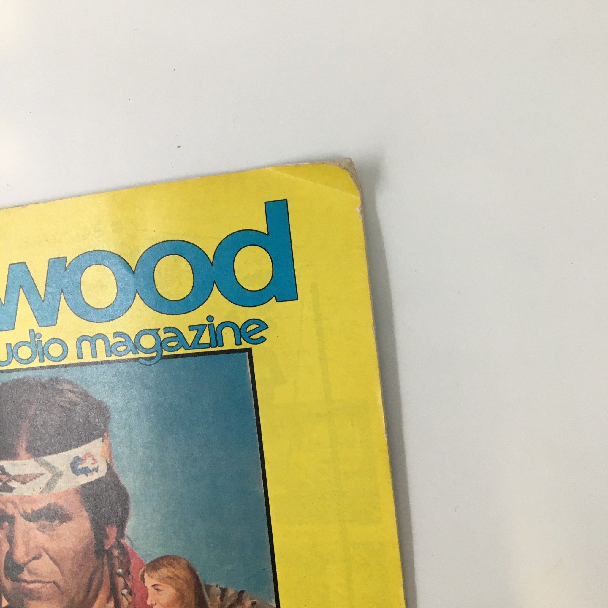 Side view of VTG Hollywood Studio Magazine April 1977, showcasing the distinct title 'Hollywood studio magazine' and part of the front cover with Alex Joseph.
