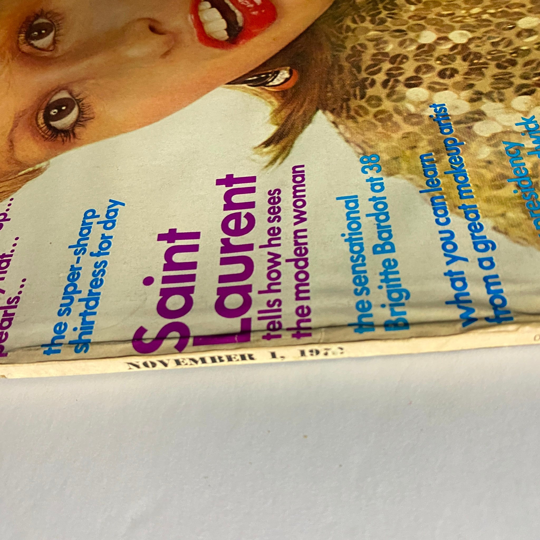 Cover detail of Vogue Magazine November 1972 featuring Saint Laurent's insights on women's fashion and modern styles.