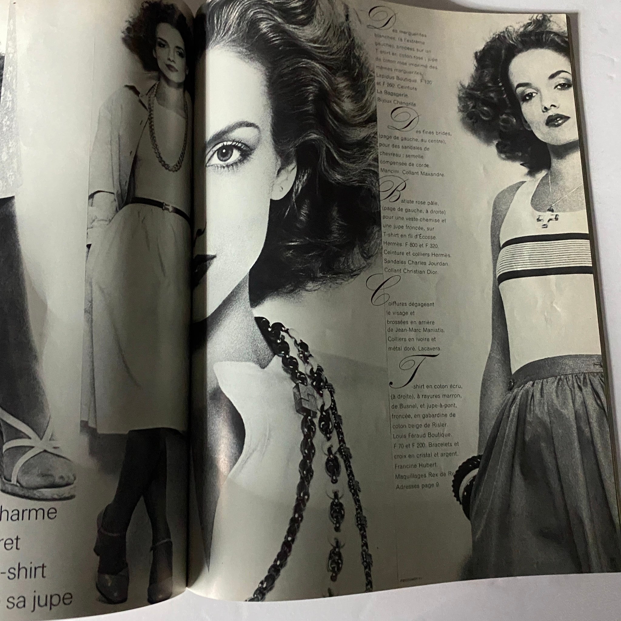 Inside spread of Vogue Paris Magazine May 1975 showcasing elegant black and white fashion photography representing 1970s style choices.