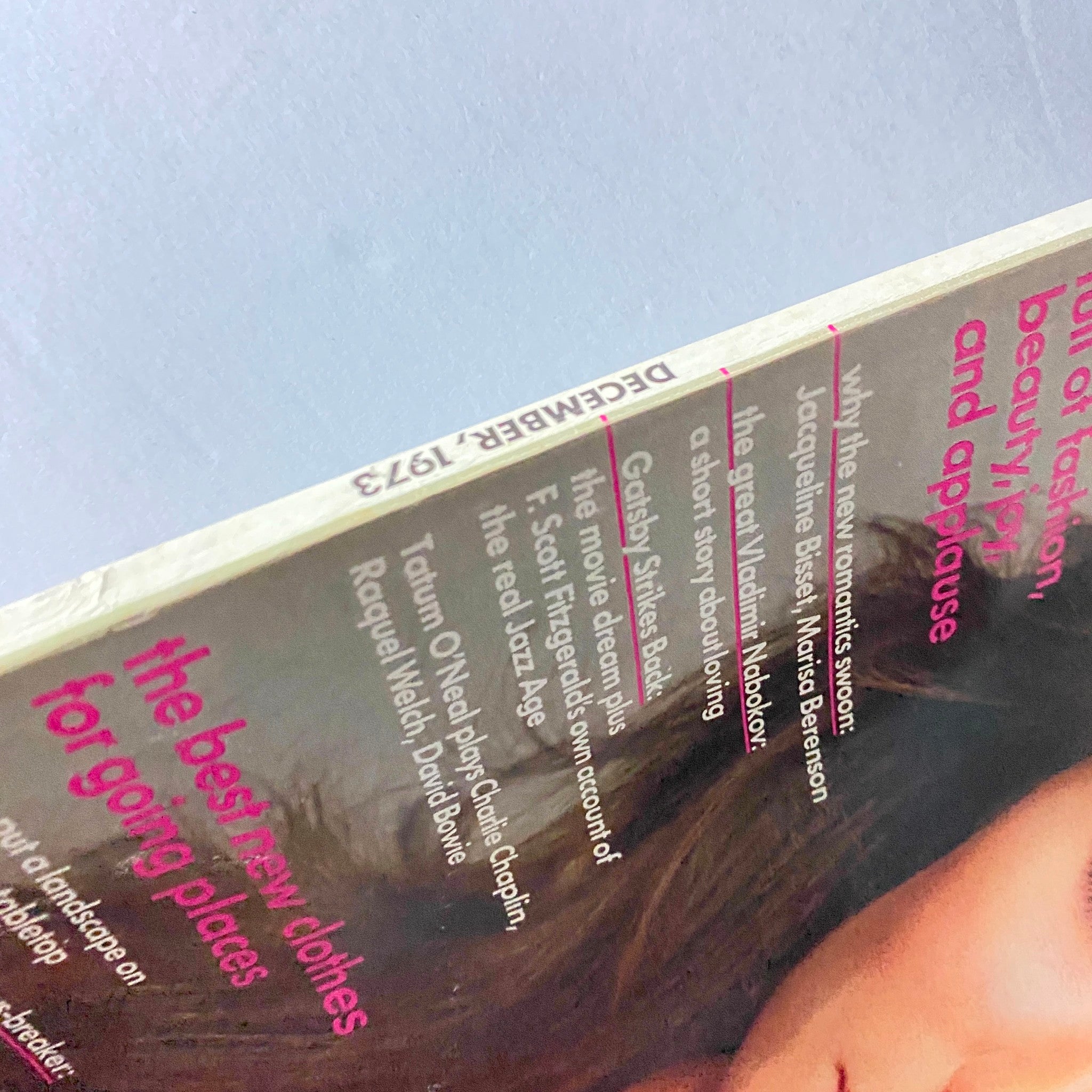 Side view of December 1973 Vogue Magazine with the title and publication date visible, featuring articles on fashion and beauty trends of the time.