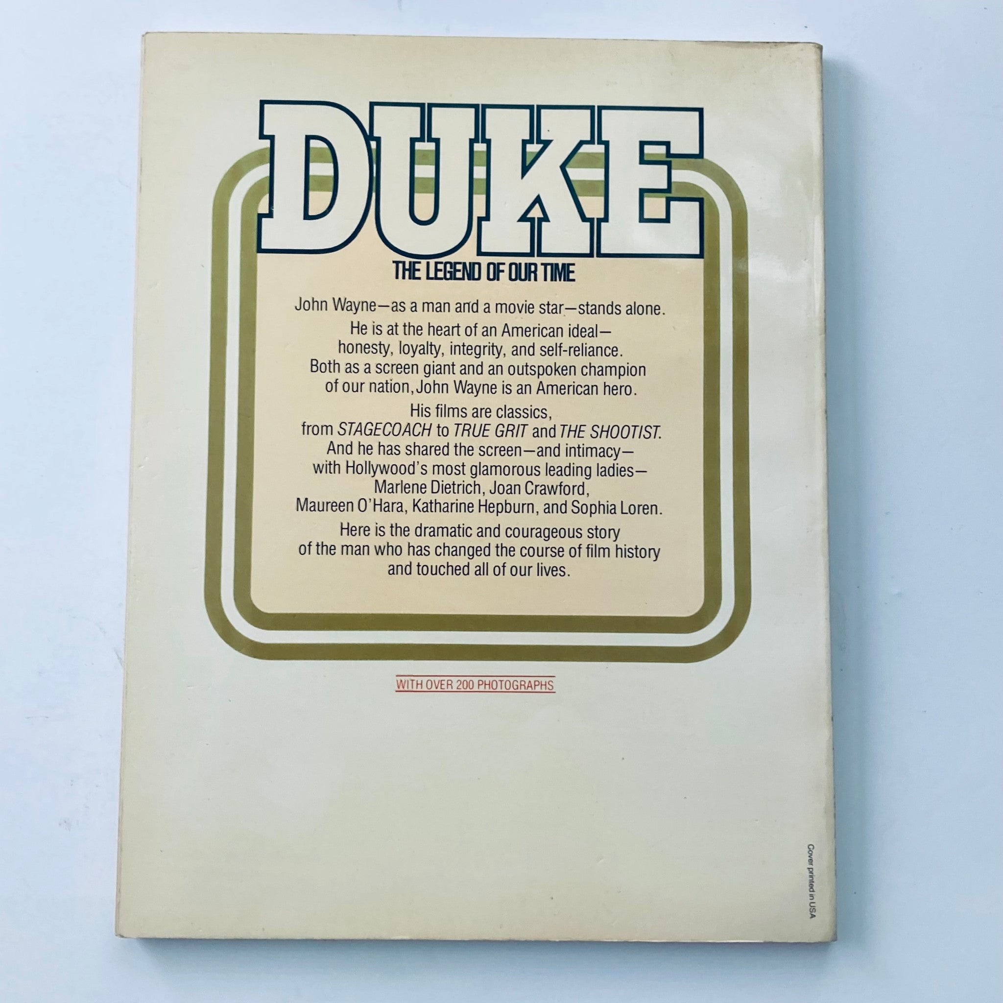 Back cover of the 1979 The John Wayne Album Duke detailing the legendary life of John Wayne with over 200 photographs.