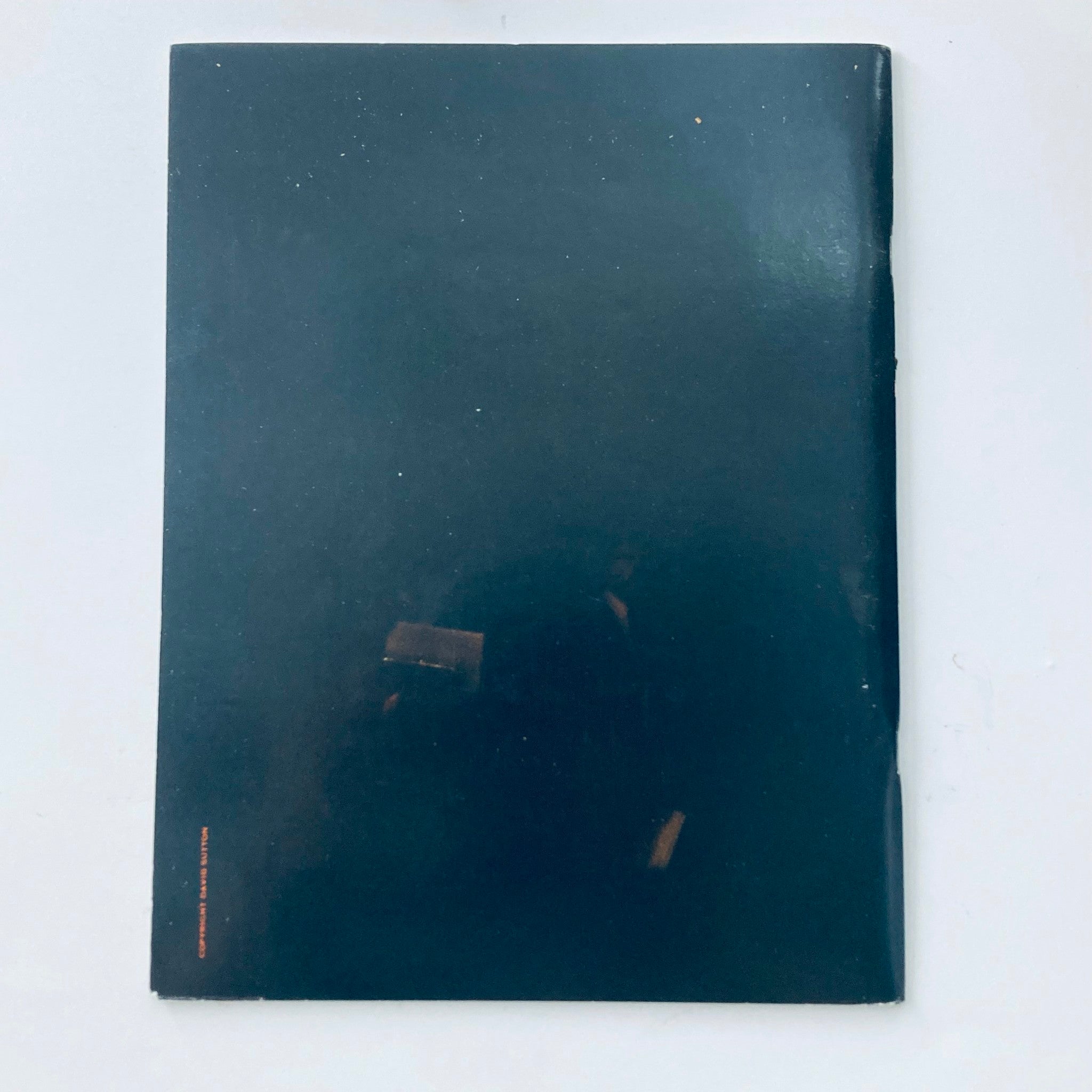 Back cover of VTG Persimmon Hill Magazine 1979 Vol 9 No. 2, showcasing a plain dark design, adding to the vintage appearance of the magazine.