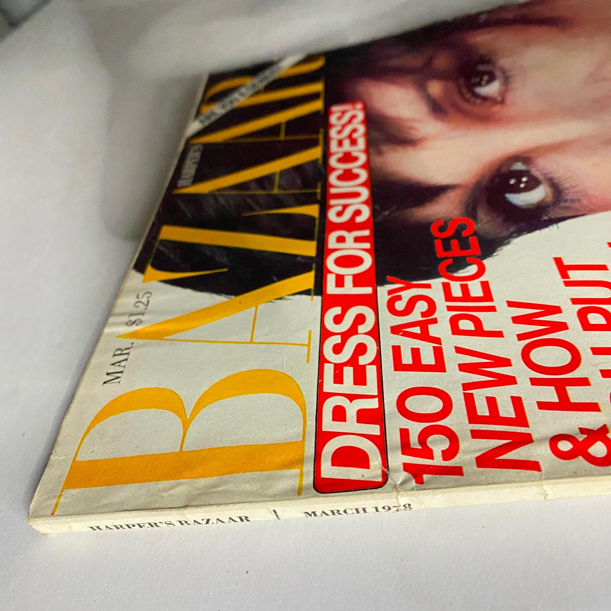 Close-up view of the Harper's Bazaar Magazine March 1978 cover featuring a bold design with the tagline 'Dress for Success!' showcasing Liza Minnelli.