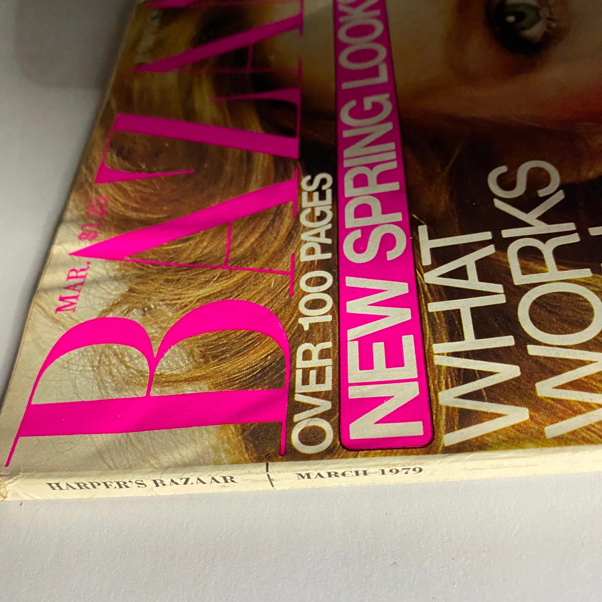 Side view of the Harper's Bazaar magazine March 1979 showing the title and publication date, emphasizing its vintage nature.