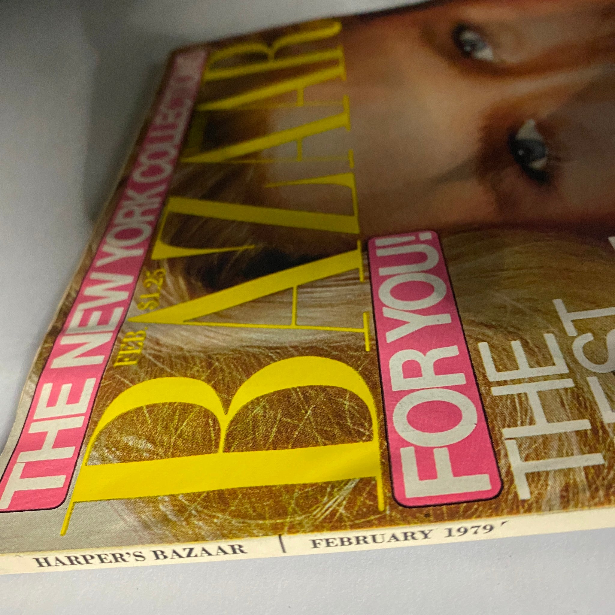 Close-up view of Harper's Bazaar Magazine February 1979 highlighting the title and publication date, with Christie Brinkley's face visible.