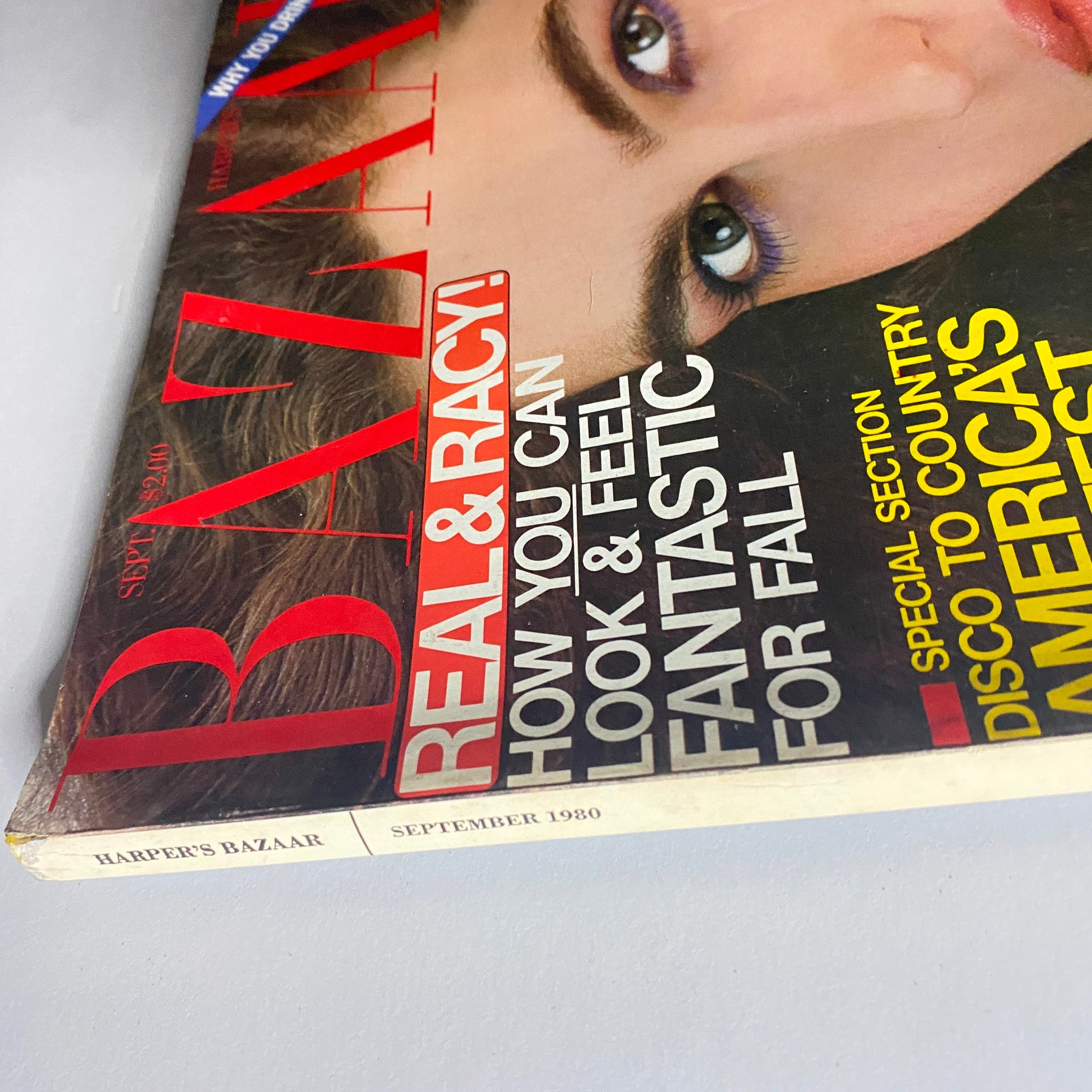 Side view of Harper's Bazaar Magazine September 1980, showing the cover featuring Eva Voorhees and printed text about fall fashion.