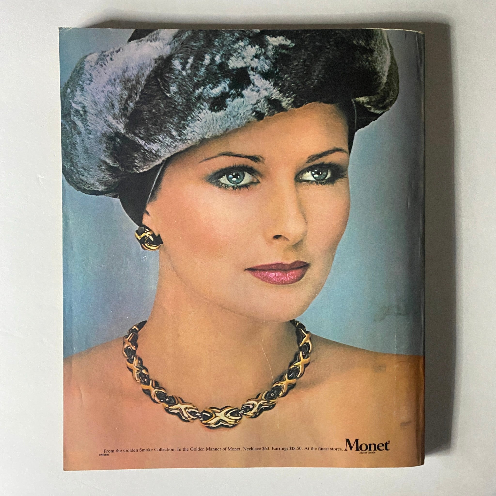 Cover of Harper's Bazaar Magazine from September 1980 featuring Eva Voorhees. The image showcases a model wearing a feathered hat and elegant jewelry, embodying the fashion trends of the 1980s.