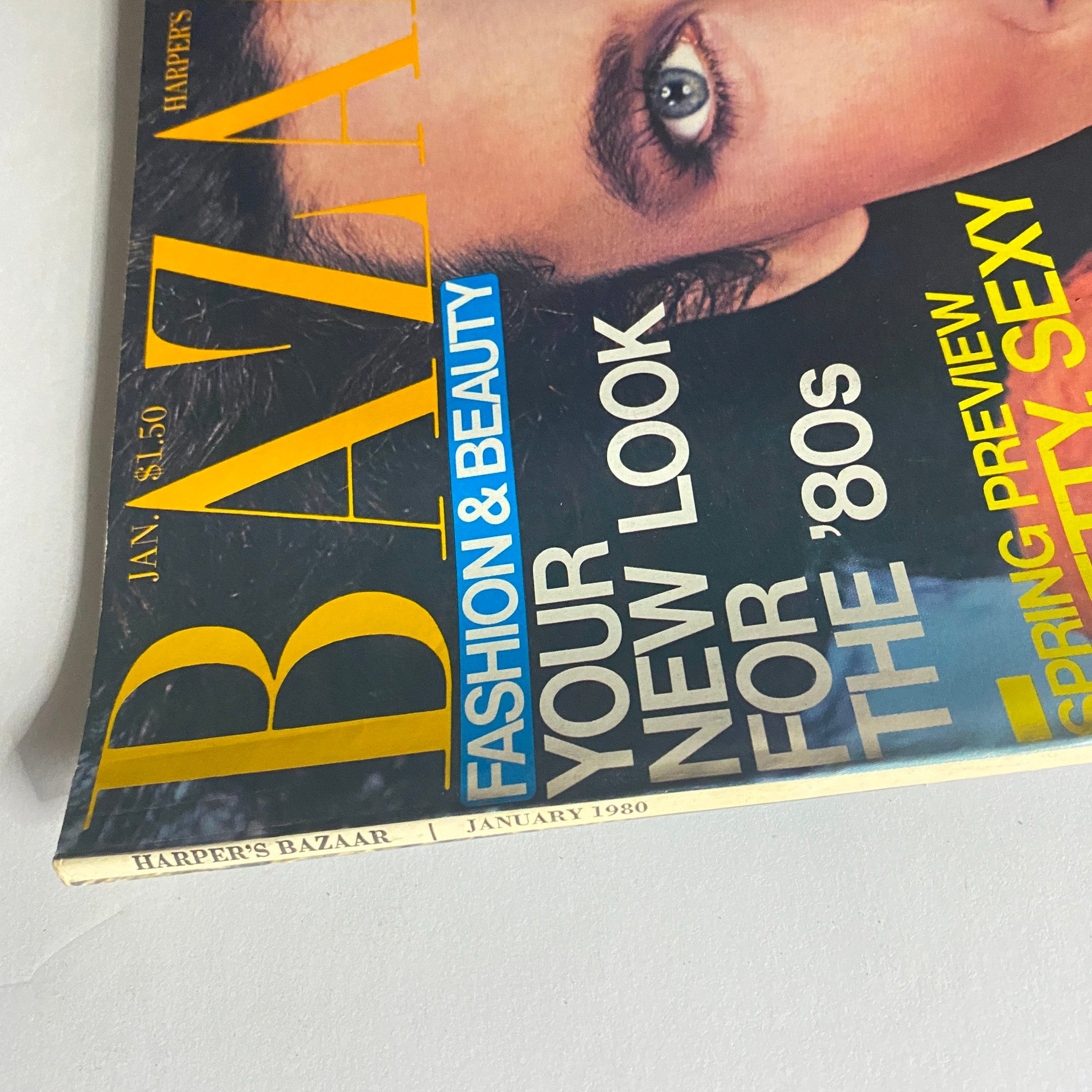 Close-up of Harper's Bazaar Magazine January 1980 showing the cover with Dayle Haddon, emphasizing 'Your New Look for The '80s' and the magazine's vibrant color scheme.