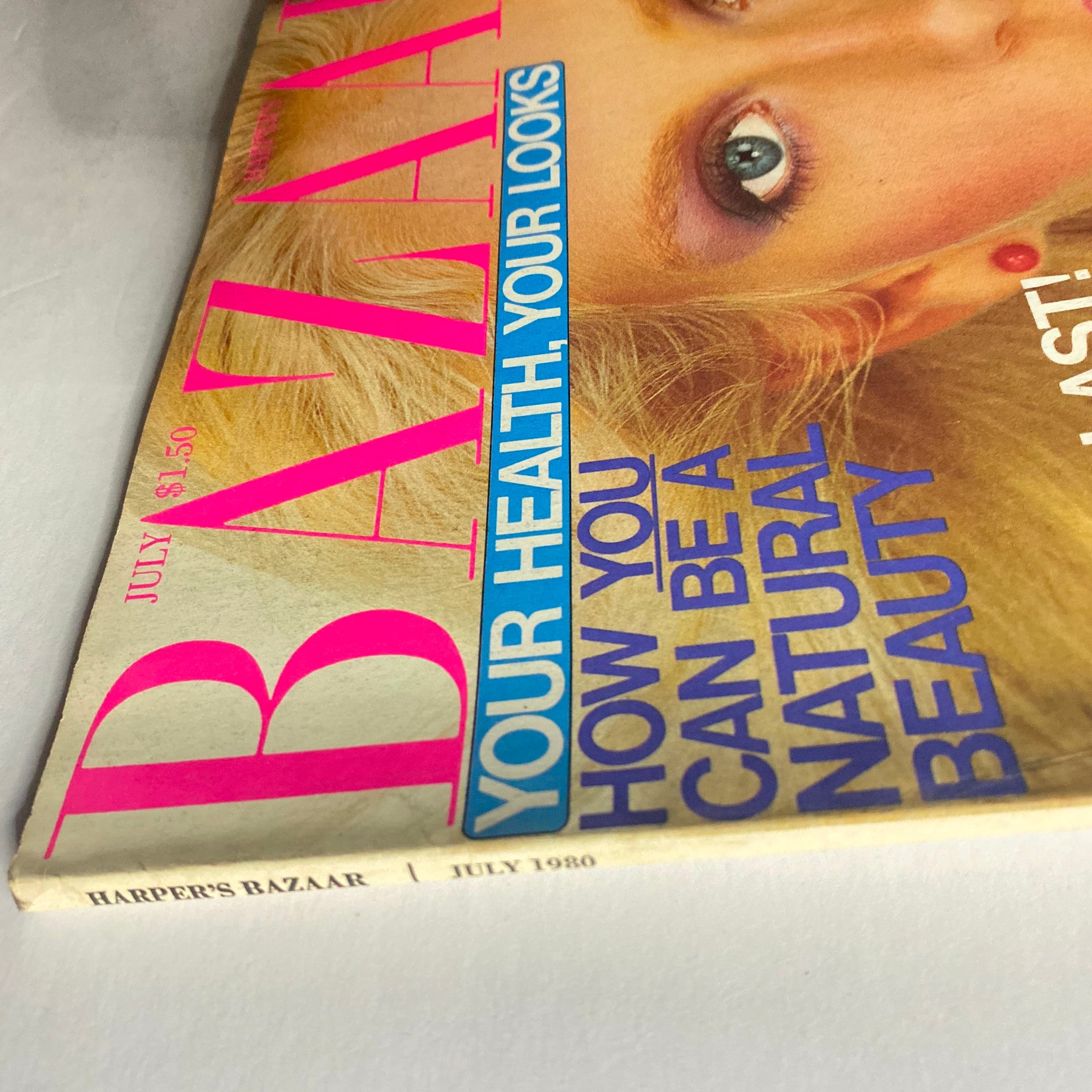 Cover of Harper's Bazaar Magazine July 1980 featuring vibrant text and natural beauty theme.