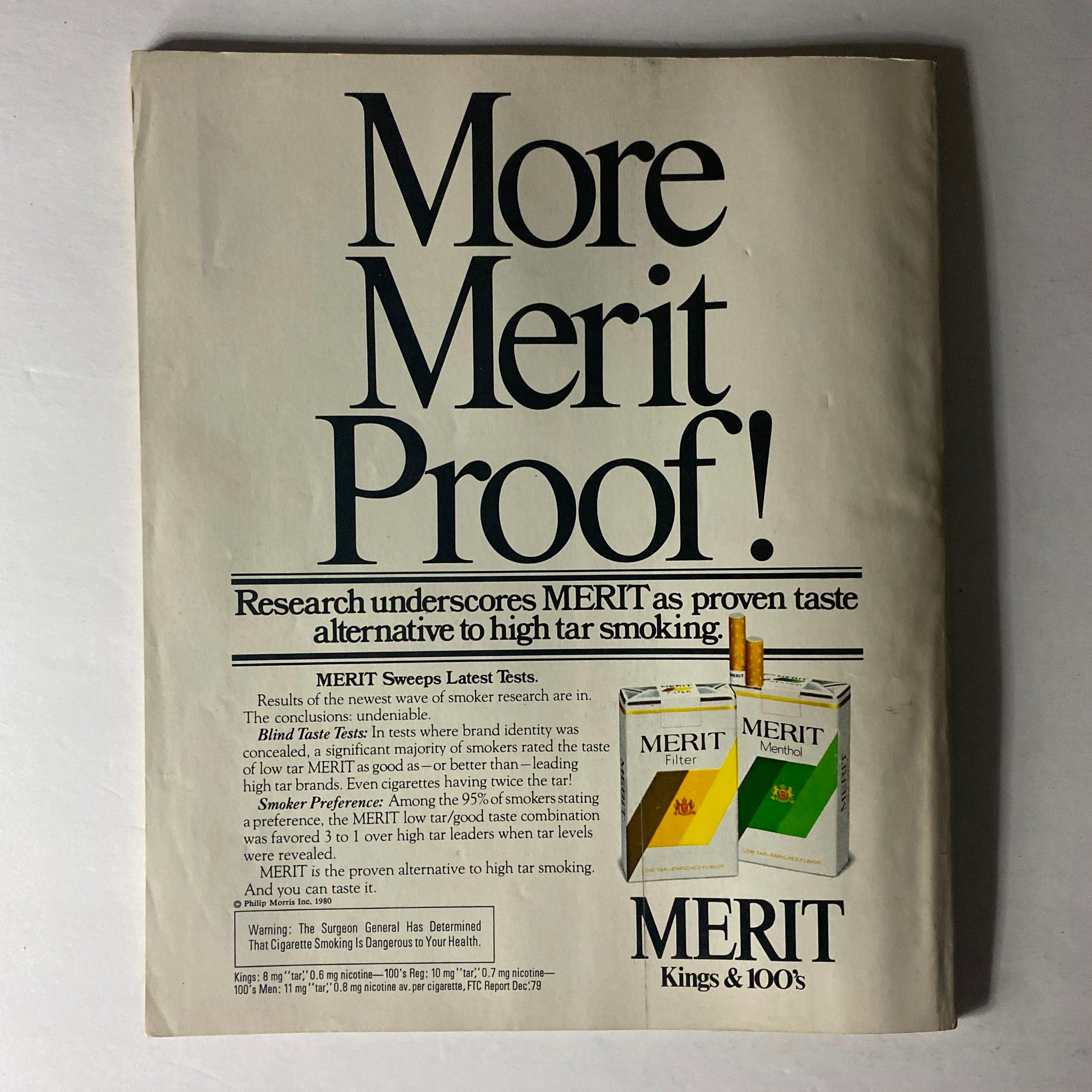 Merit cigarette advertisement from Harper's Bazaar Magazine July 1980 discussing its low tar qualities.